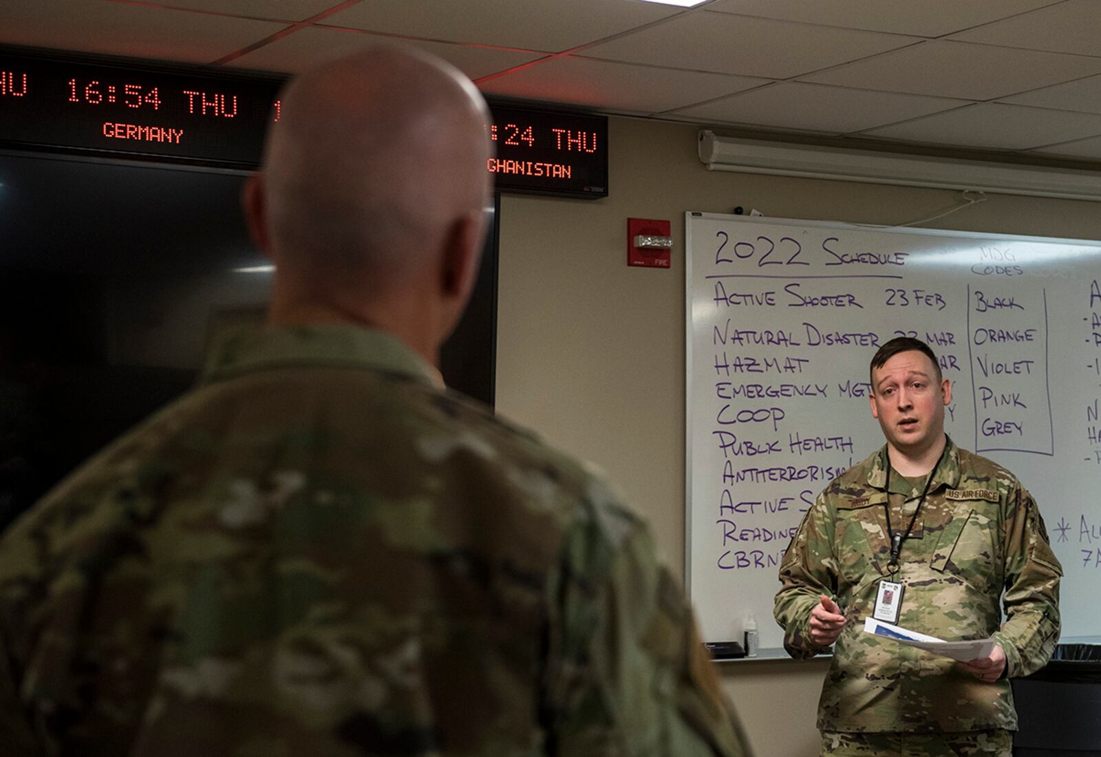 Staff Sgt. Patrick Rooy, unit deployment manager for the 88th Medical Support Squadron’s Medical Readiness Flight, gives a brief March 10 to Chief Master Sgt. David Flosi, Air Force Materiel Command command chief, explaining the 88th Medical Group’s deployment capabilities and operational tempo. U.S. AIR FORCE PHOTO/JAIMA FOGG