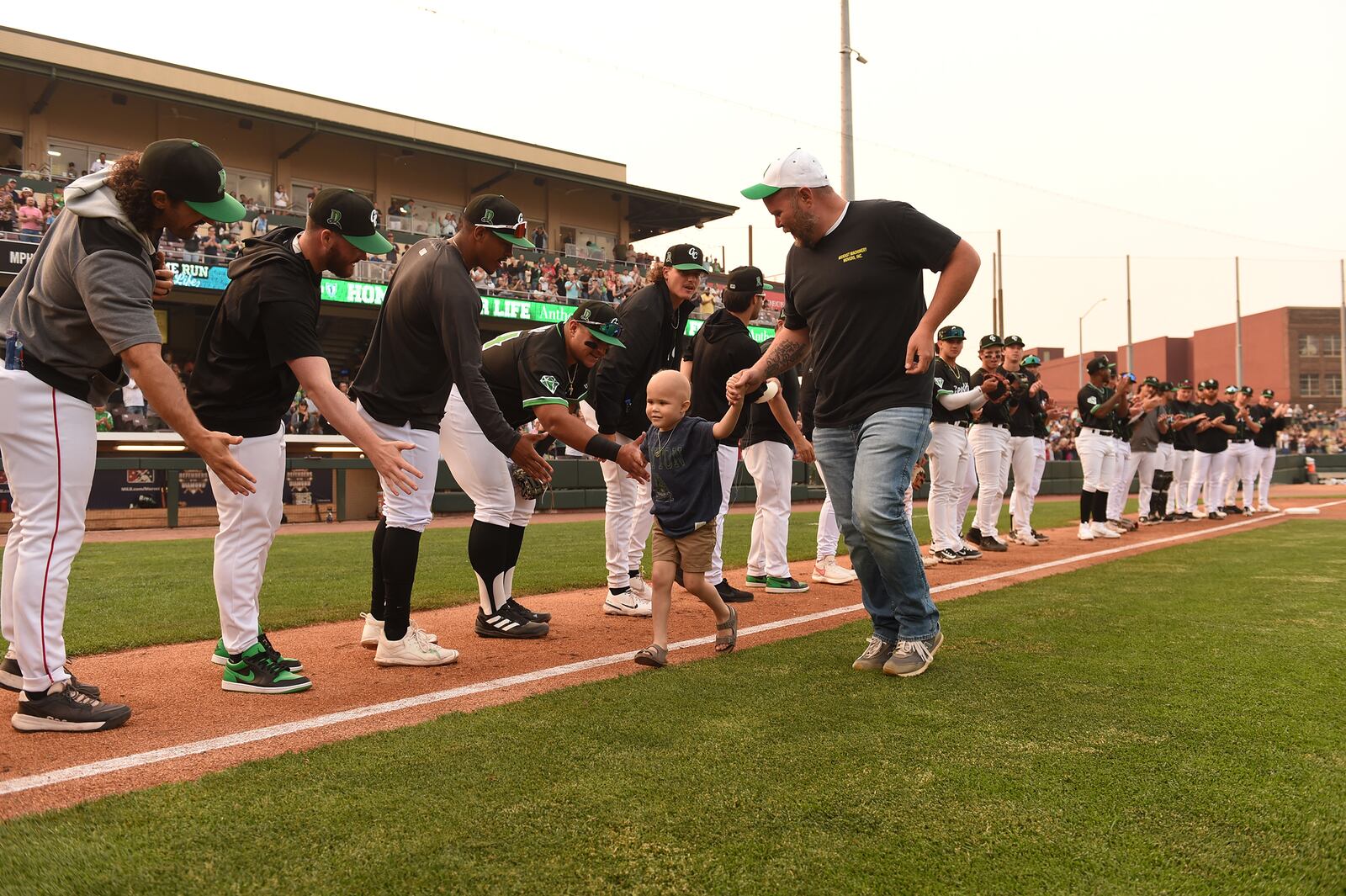 At the annual "Home Run for Life" event, one child who is ill or recovering from a serious illness is chosen to run the bases during a game while the team pauses to cheer. This year's event was held on June 7, 2023. CONTRIBUTED