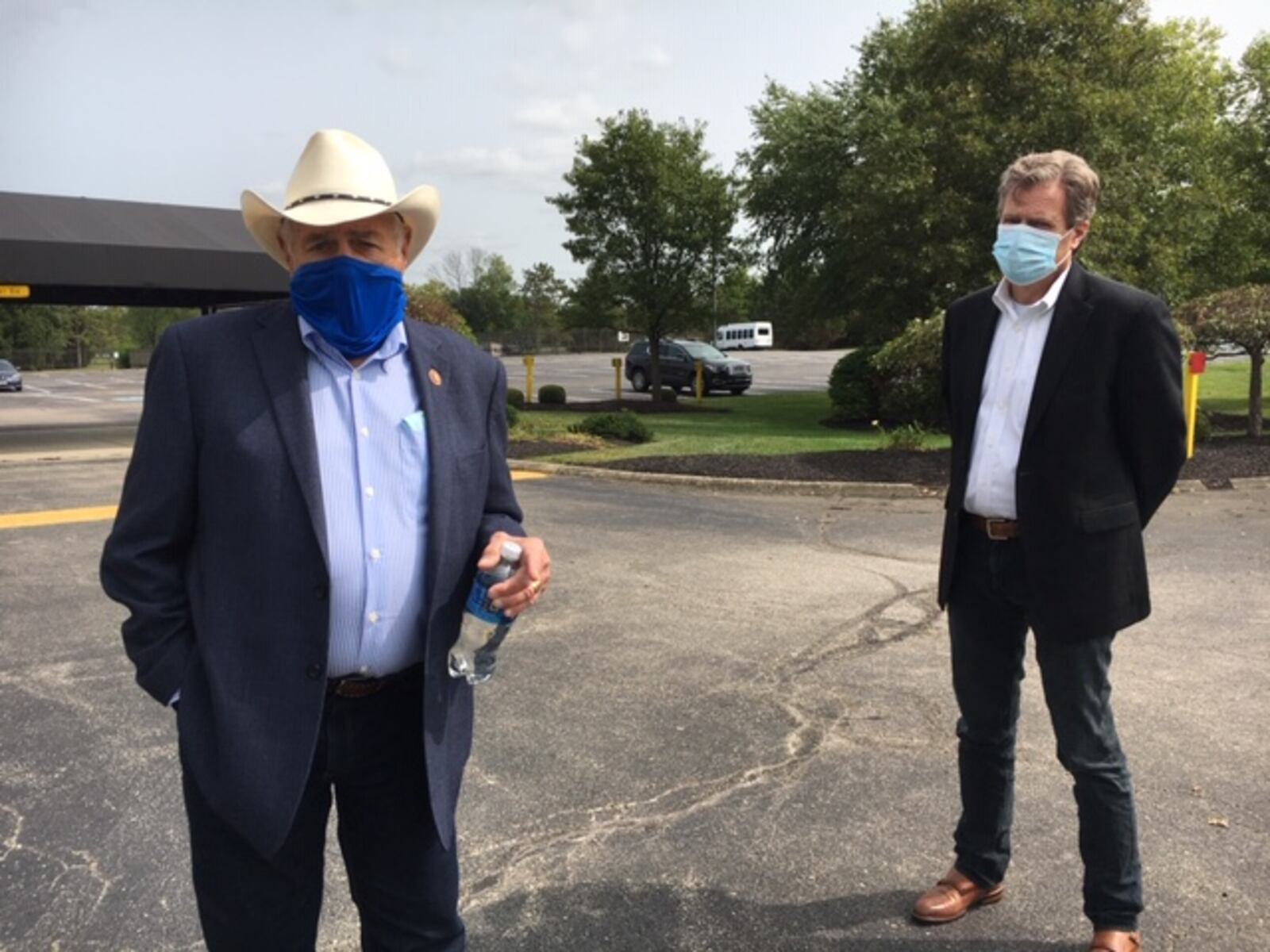 U.S. Rep. John Carter, R-Texas, spoke in September outside the Hope Hotel at Wright-Patterson Air Force Base, with U.S. Rep. Mike Turner, R-Dayton, on the right. THOMAS GNAU/STAFF