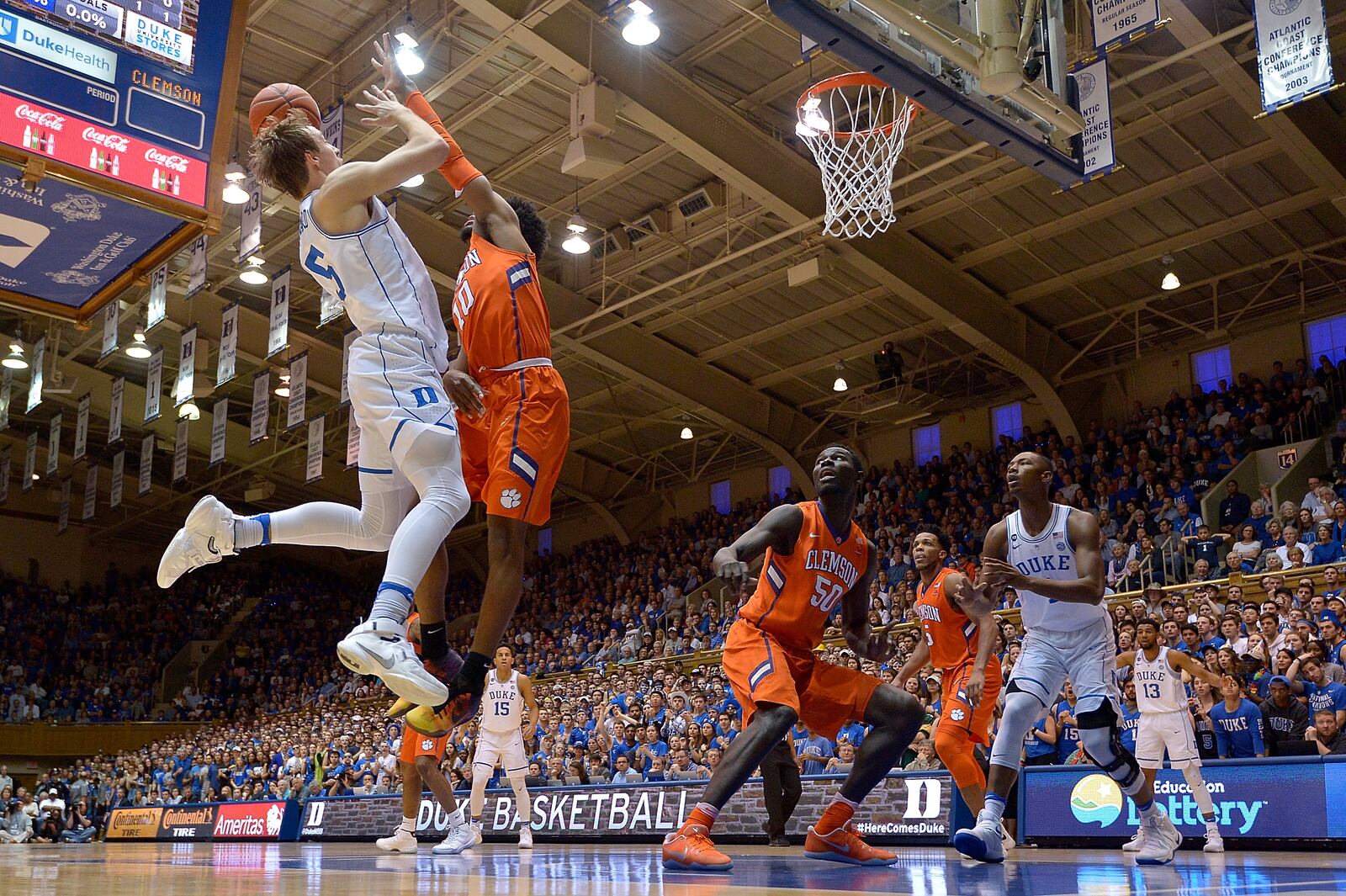 DURHAM, NC - FEBRUARY 11: Luke Kennard #5 of the Duke Blue Devils shoots against Gabe DeVoe #10 of the Clemson Tigers during the game at Cameron Indoor Stadium on February 11, 2017 in Durham, North Carolina. (Photo by Grant Halverson/Getty Images)