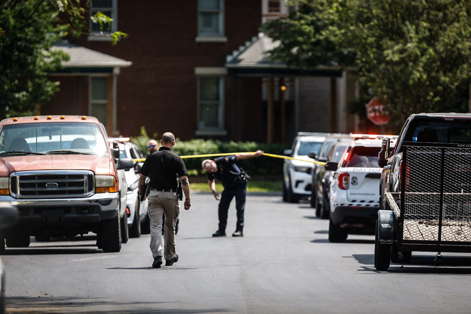 Dayton police responded to Centre Street in Dayton on Thursday, June 1, 2023, after a man was reportedly shot in the stomach. JIM NOELKER/STAFF