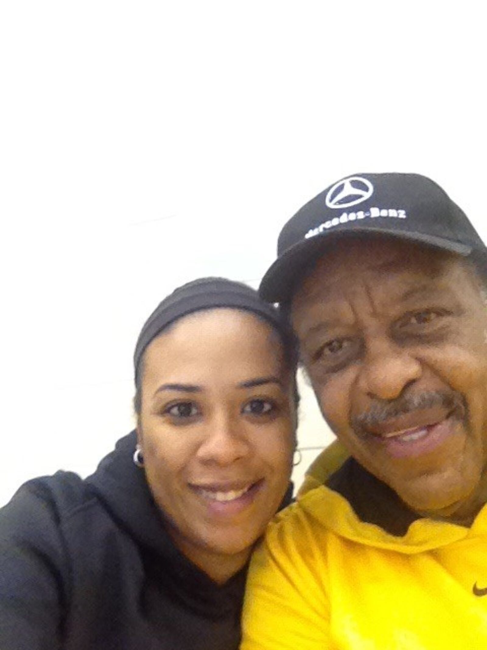 Trina Merriweather and her grandfather, Willie Merriweather, the Hall of Fame basketball player who starred at Crispus Attucks High in Indianapolis and was an All American at Purdue. CONTRIBUTED