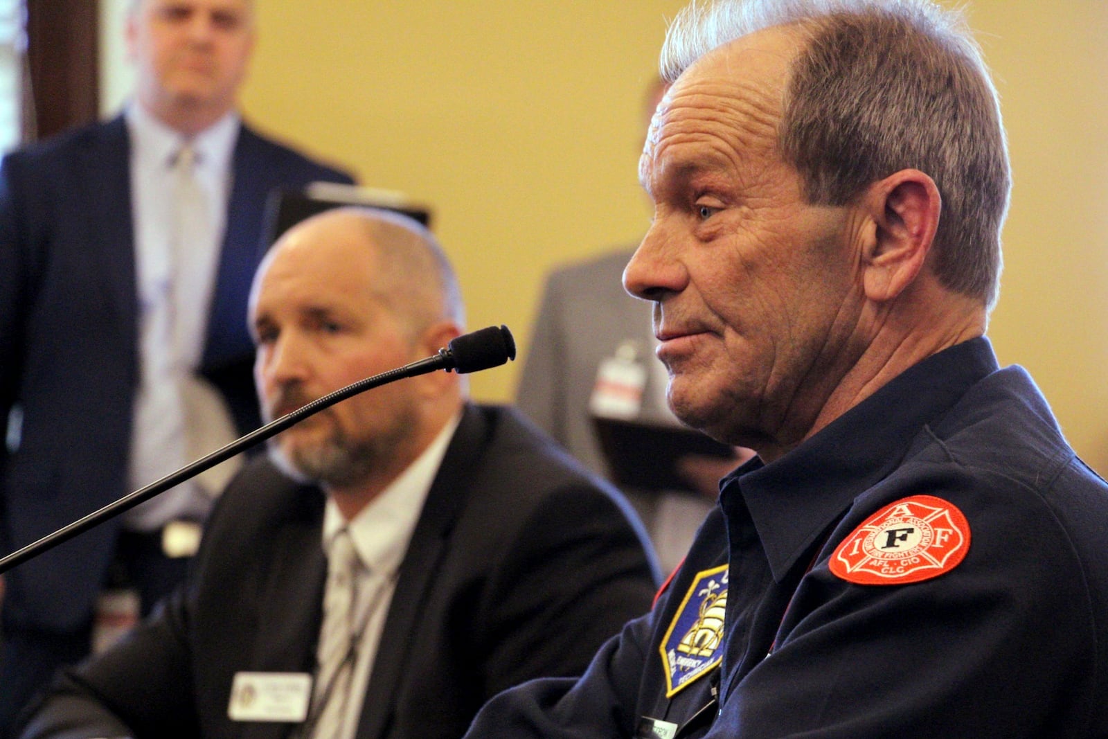 Firefighter Jack Tidrow speaks in opposition to a Utah bill that would ban collective bargaining in public sector jobs, Thursday, Jan. 23, 2025, at the Capitol Building in Salt Lake City. (AP Photo/Hannah Schoenbaum)