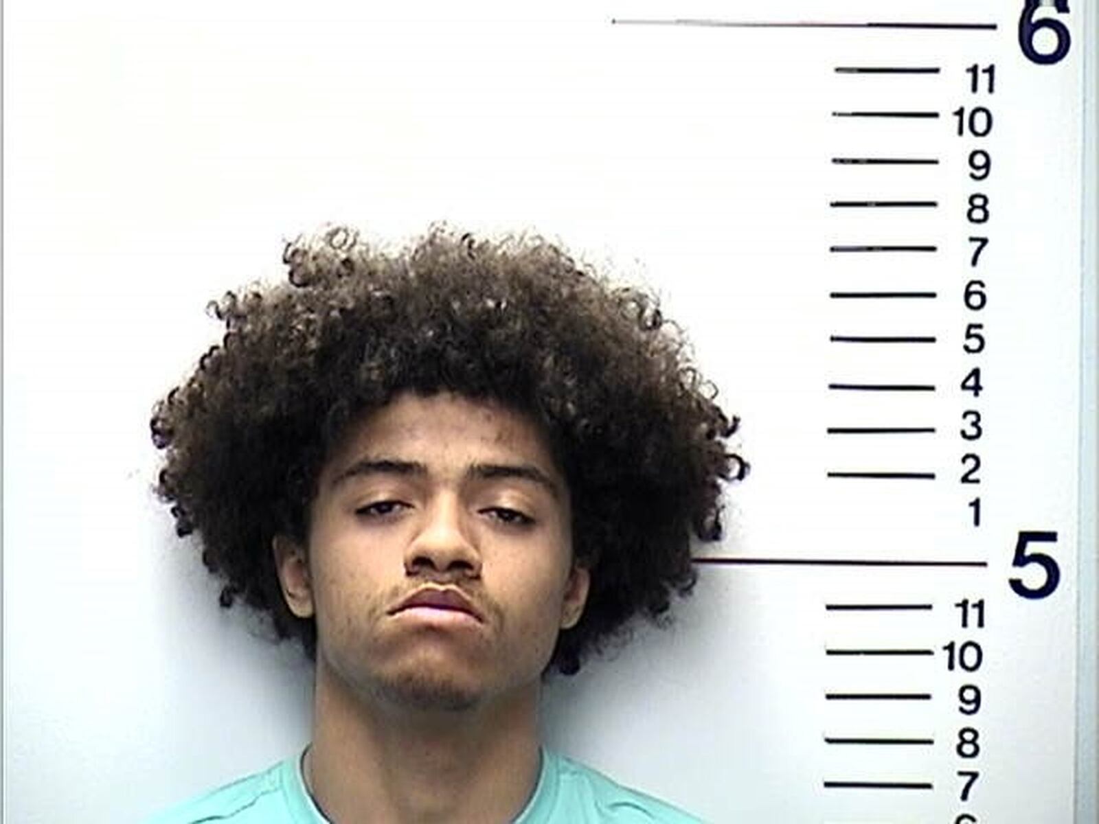 Andre Durr, 18, of Dayton, was charged with receiving stolen property, fleeing and eluding police and child endangering after he allegedly fled from a stolen car Tuesday morning in Middletown.