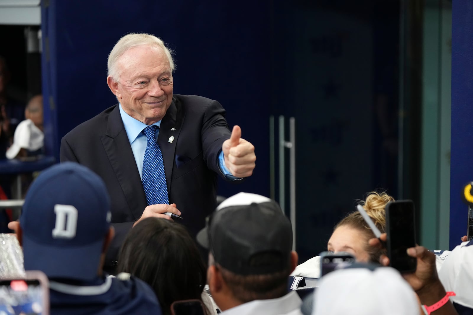 Dallas Cowboys team owner Jerry Jones interacts with fans before an NFL football game against the Philadelphia Eagles in Arlington, Texas, Sunday, Nov. 10, 2024. (AP Photo/Jeffrey McWhorter)