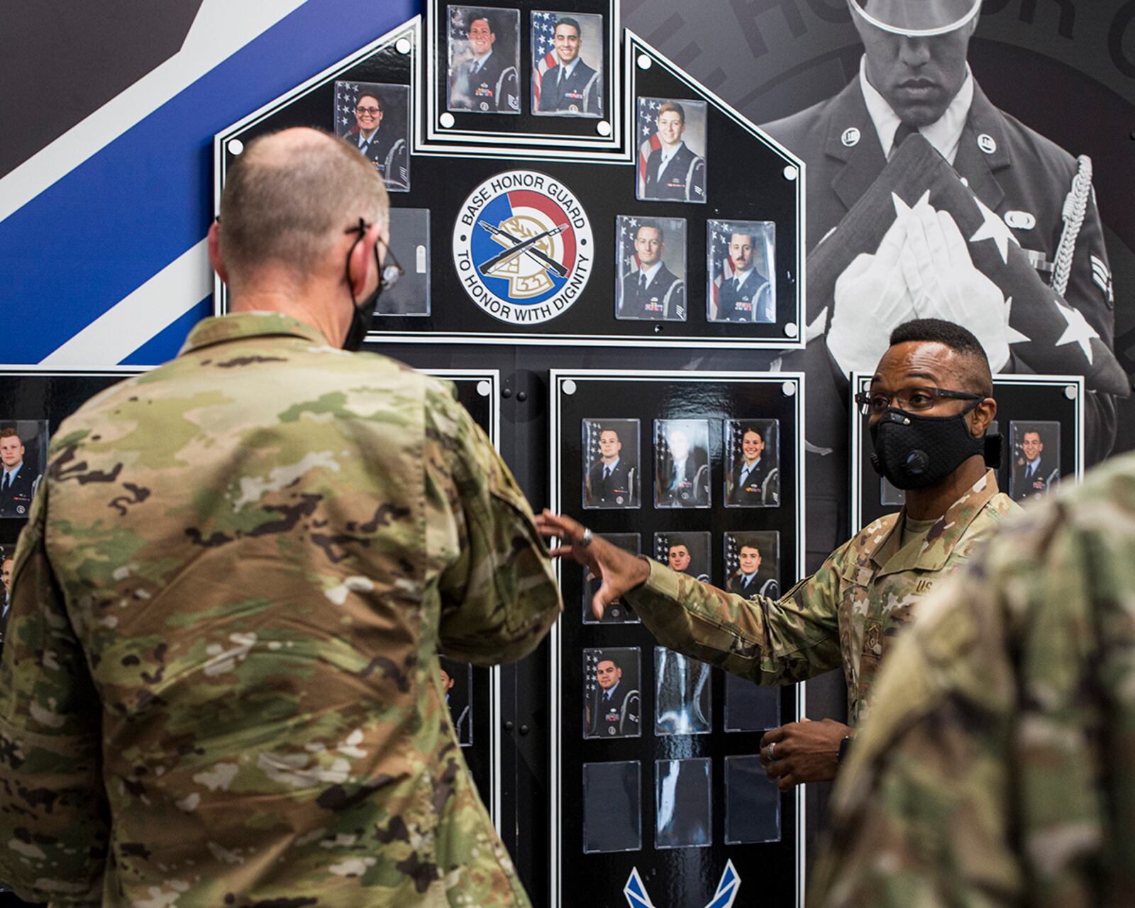 Gen. Duke Richardson (left), Air Force Materiel Command commander, listens to Master Sgt. Joshua Lane, Wright-Patterson Air Force Base Honor Guard superintendent, during a tour of the detachment’s facilities Aug. 22. U.S. AIR FORCE PHOTO/JAIMA FOGG