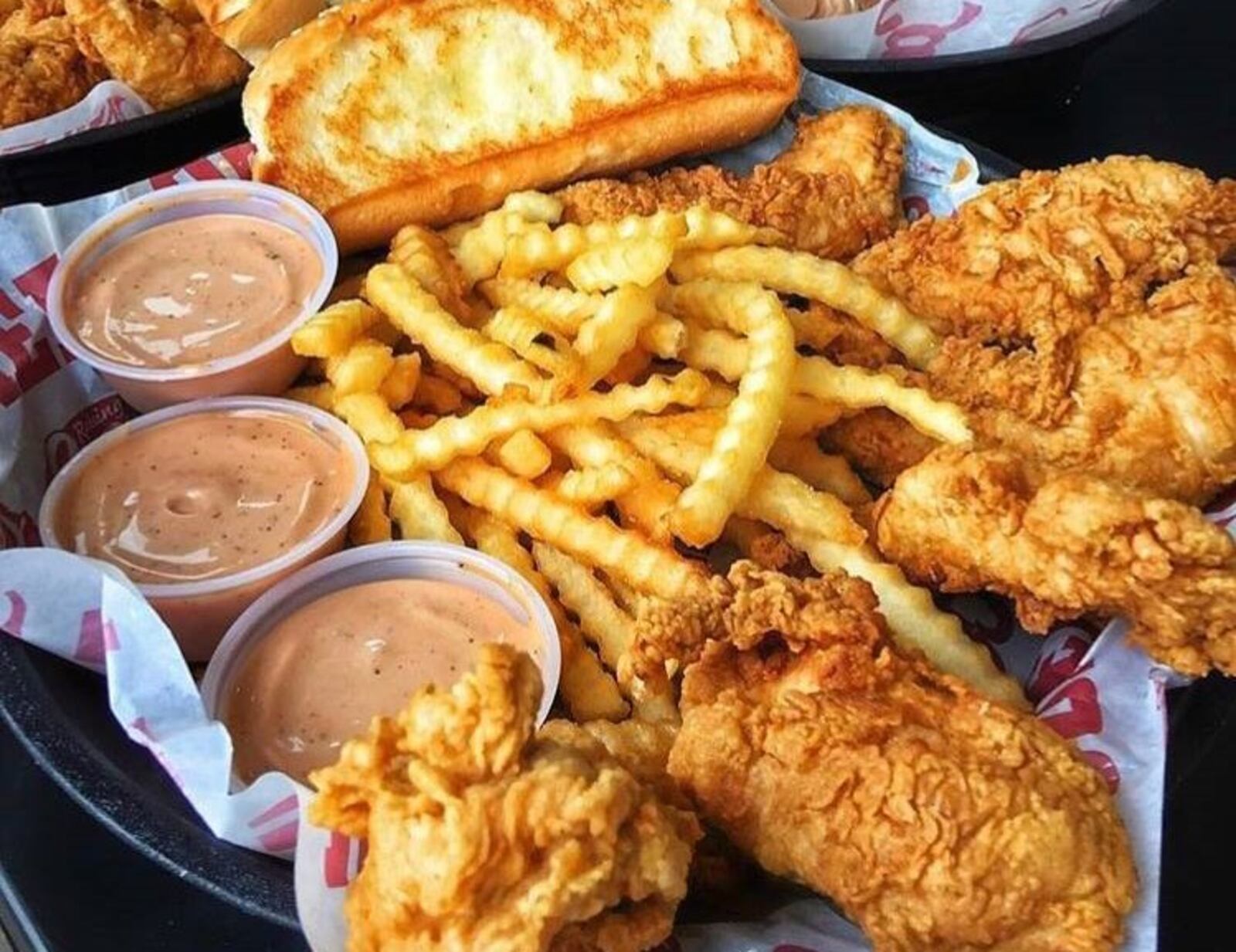 Plans have been submitted for a new Raising Cane’s Chicken Fingers across from The Greene. Photo from Raising Cane’s Chicken Fingers Facebook page