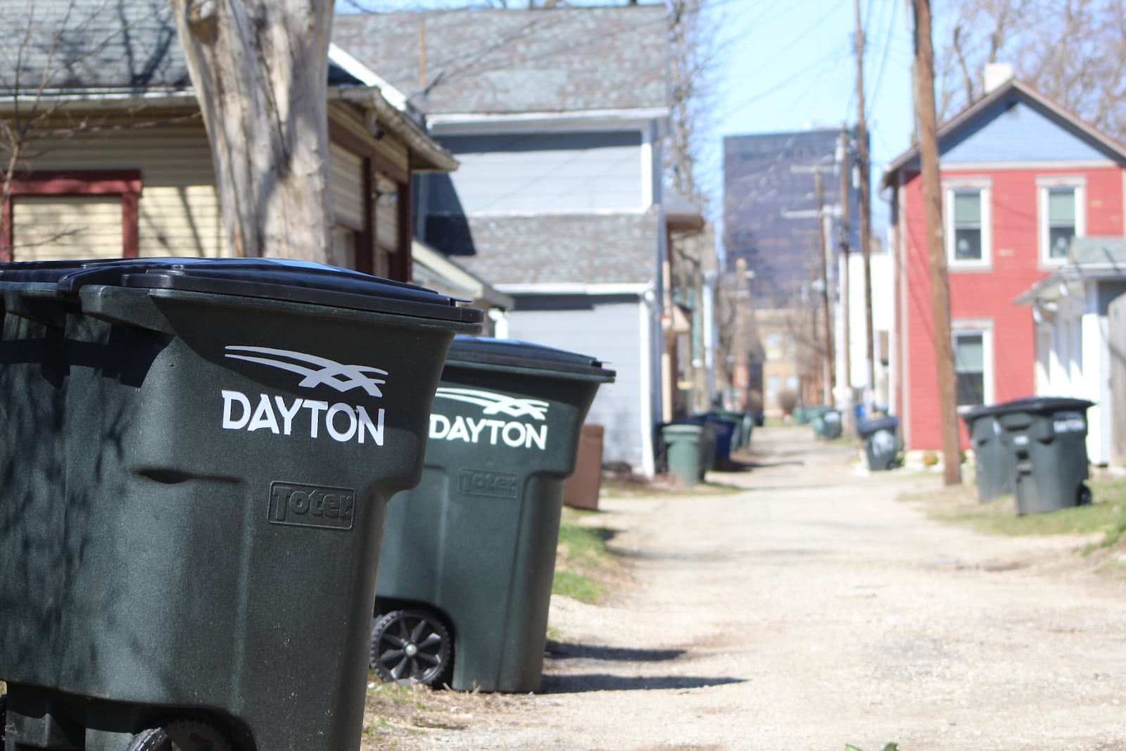 Dayton says it has a backlog of about 900 trash containers. City officials say they are working to fix the problem in coming weeks and months. CORNELIUS FROLIK / STAFF