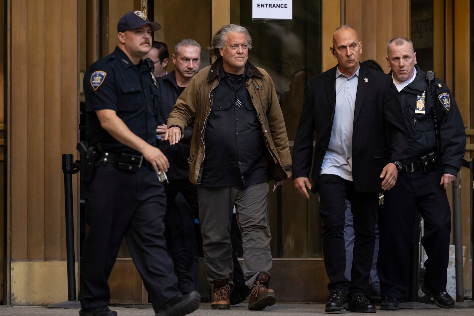 Steve Bannon exits Manhattan criminal court in New York, Tuesday, Nov. 12, 2024. (AP Photo/Yuki Iwamura)