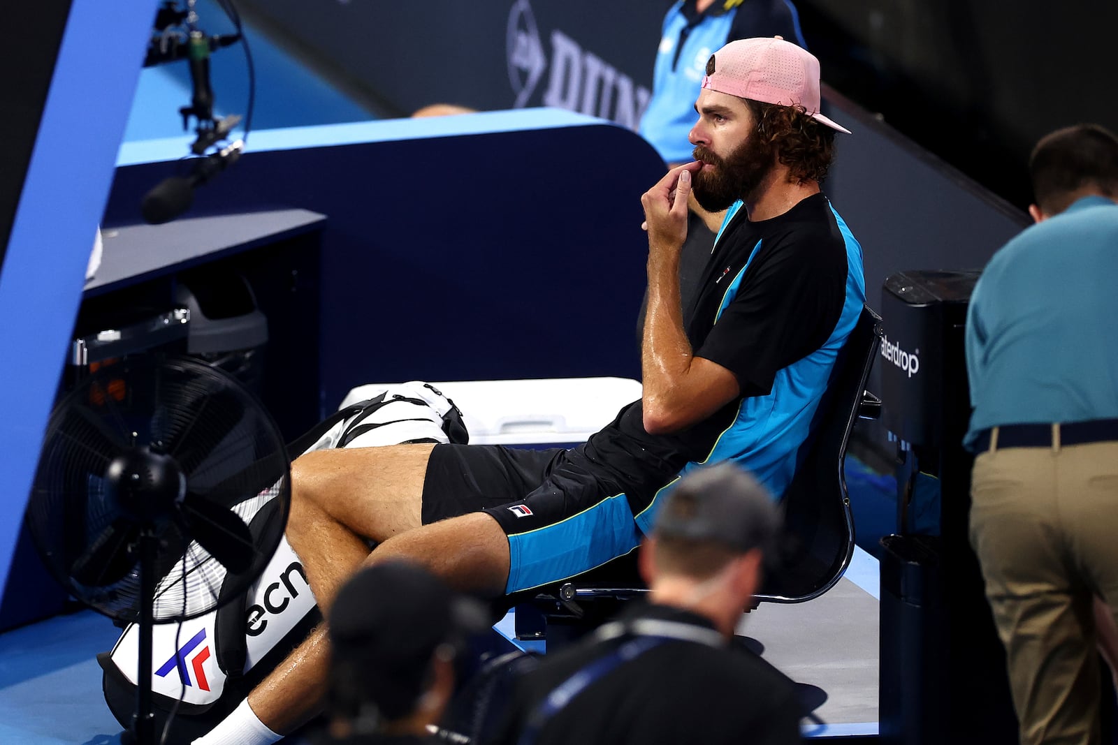 USA's Reilly Opelka retires injured during his final match against Czech Republic's Jiri Lehecka at the Brisbane International in Brisbane, Australia, Sunday, Jan. 5, 2025. (AP Photo/Pat Hoelscher)