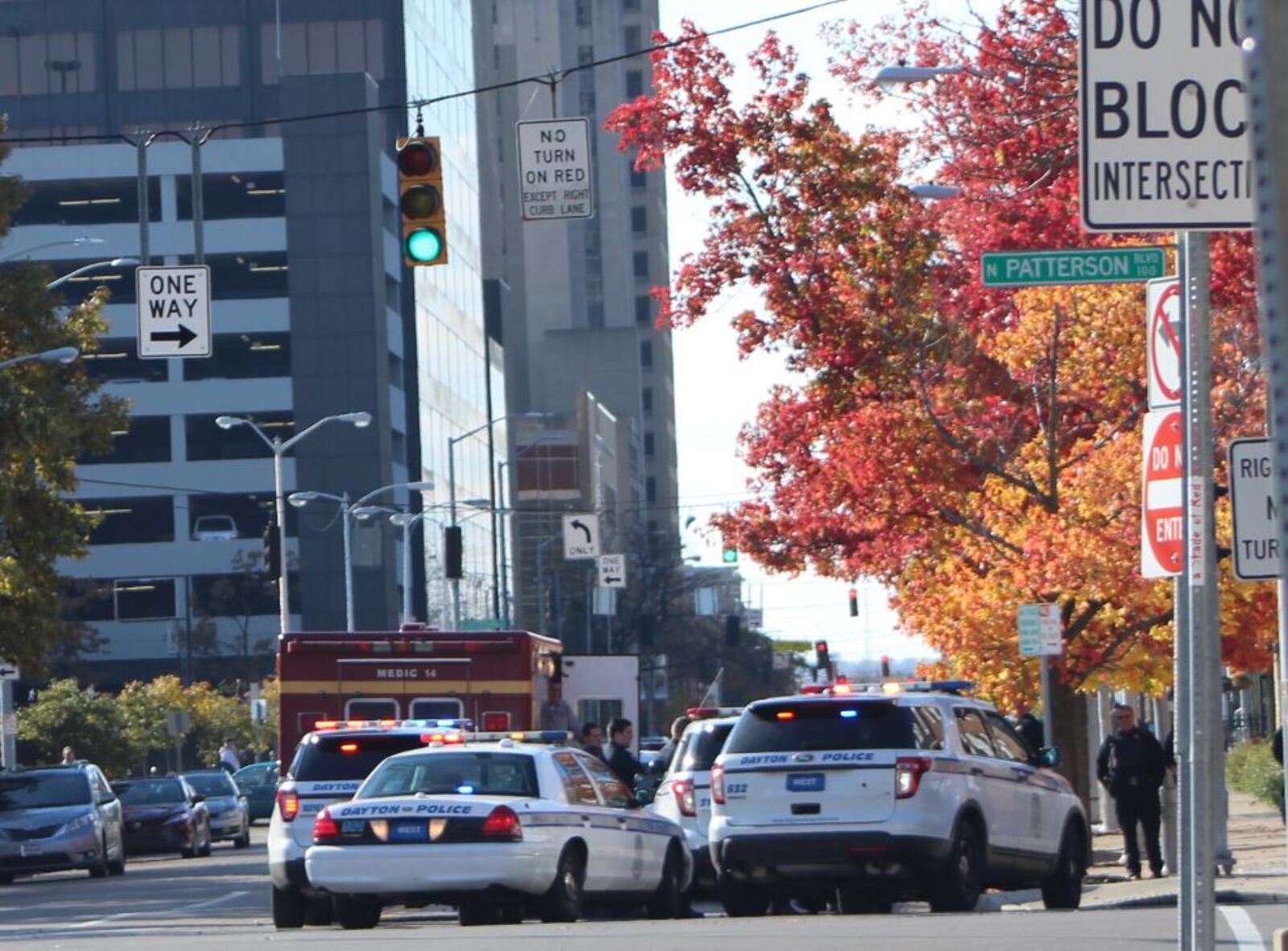 Dayton police and EMS crews respond to an incident in downtown Dayton. CORNELIUS FROLIK / STAFF