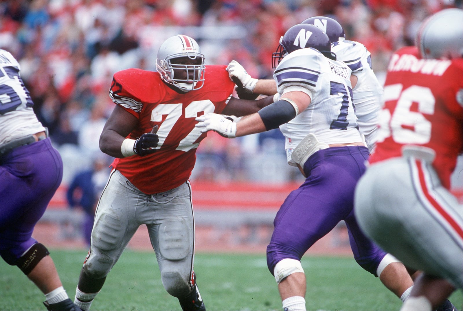 2 OCT 1993:  DAN WILKINSON OF OHIO STATE DRIVES PAST THE OFFENSIVE LINE OF NORTHWESTERN IN THE BUCKEYES 51-3 VICTORY OVER THE WILDCATS. Mandatory Credit: JAMIE SABAU/ALLSPORT