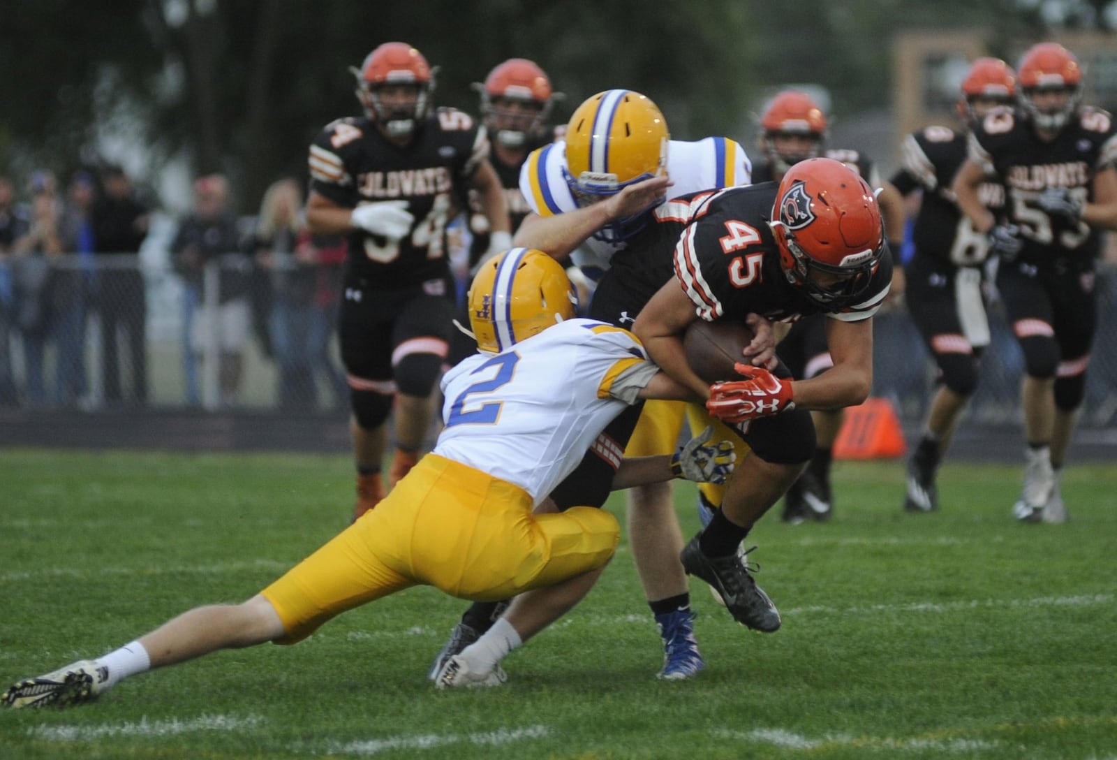 Marion Local defender Tyler Prenger (2) takes down Coldwater’s Caleb Dippold. Marion Local defeated host Coldwater 13-7 in the Week 3 high school football game on Friday, Sept. 8, 2017. MARC PENDLETON / STAFF