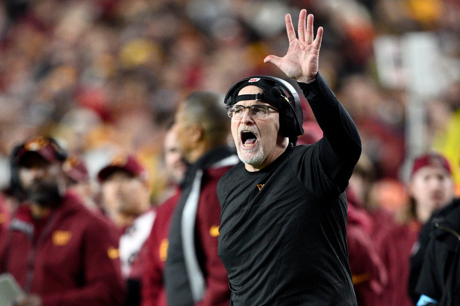 FILE - Washington Commanders head coach Dan Quinn calls out from the sideline during the second half of an NFL football game against the Atlanta Falcons, Sunday, Dec. 29, 2024, in Landover, Md. (AP Photo/Nick Wass, File)