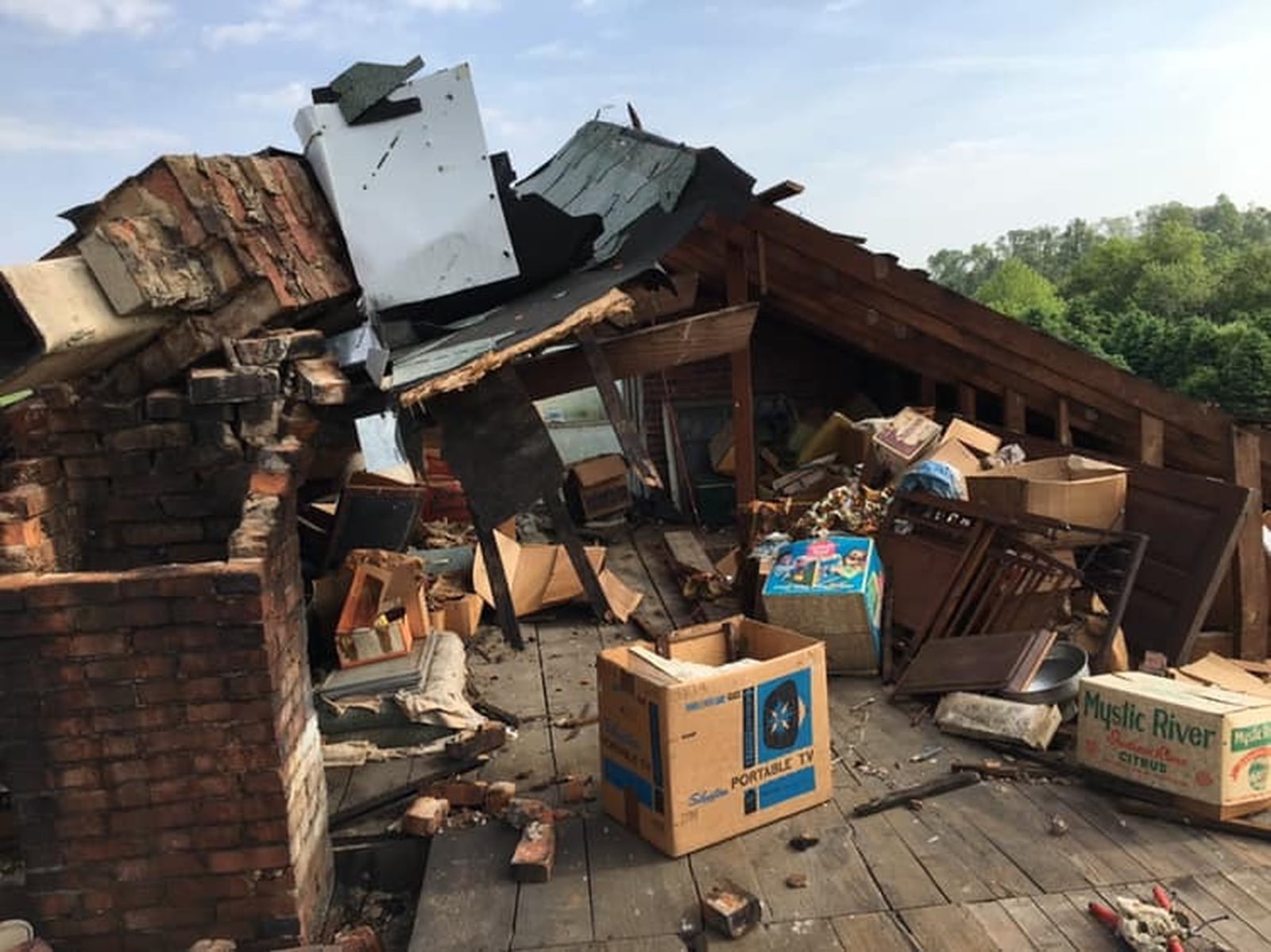 Last Monday’s tornado tore the roof off this home owned by James and Mary Ann Barr at 1045 Ludlow Road in Beavercreek Township and damaged two other buildings. It is their second tornado in just over a year. The home was also damaged by a tornado on April 3, 2018, and two other buildings were badly damaged and had to be replaced. PHOTOS contributed by Barbara Barr