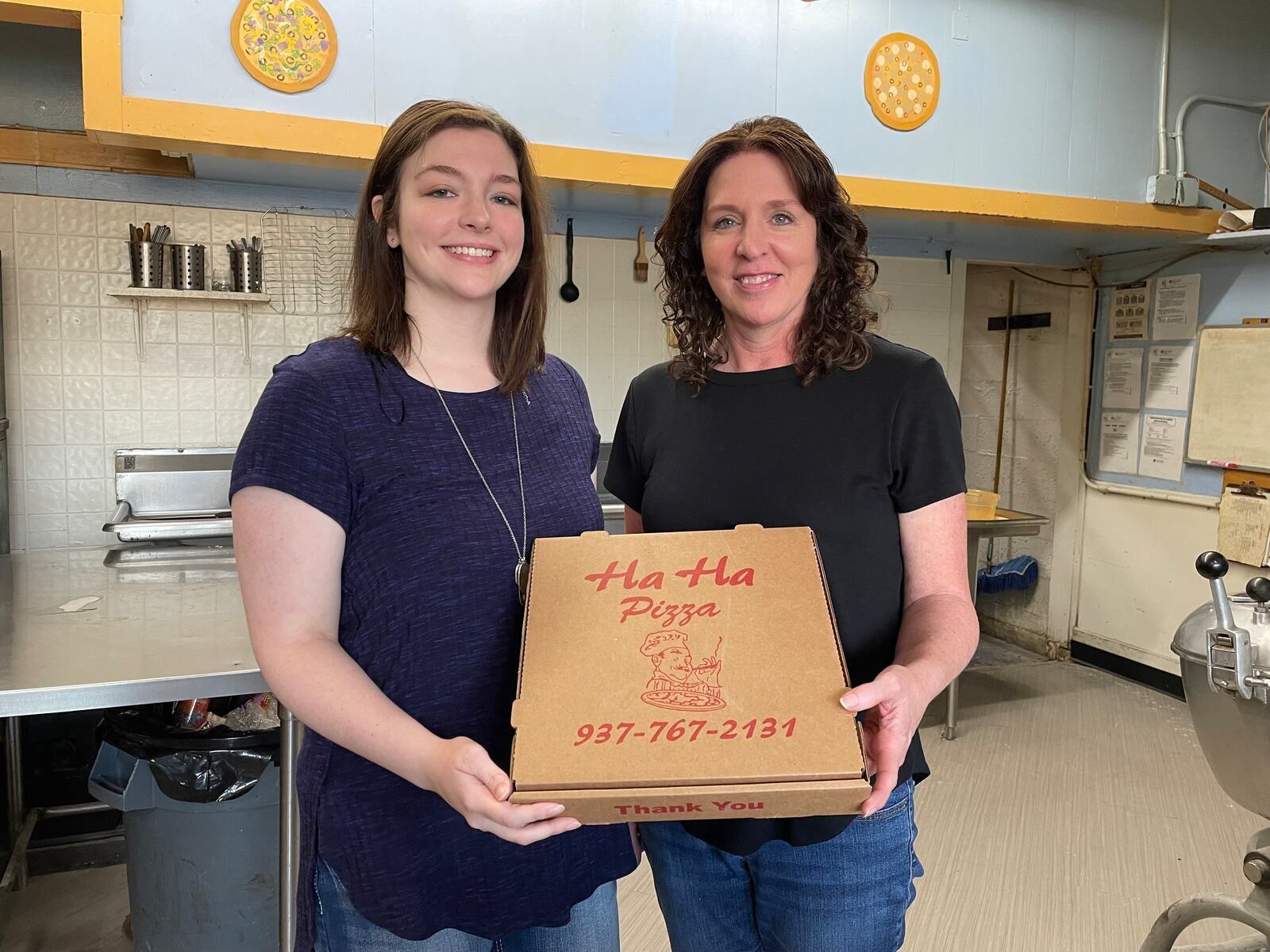 Karen (right) and Megan (left) McDonald, a mother and daughter team, are the new owners of Ha Ha Pizza in Yellow Springs.