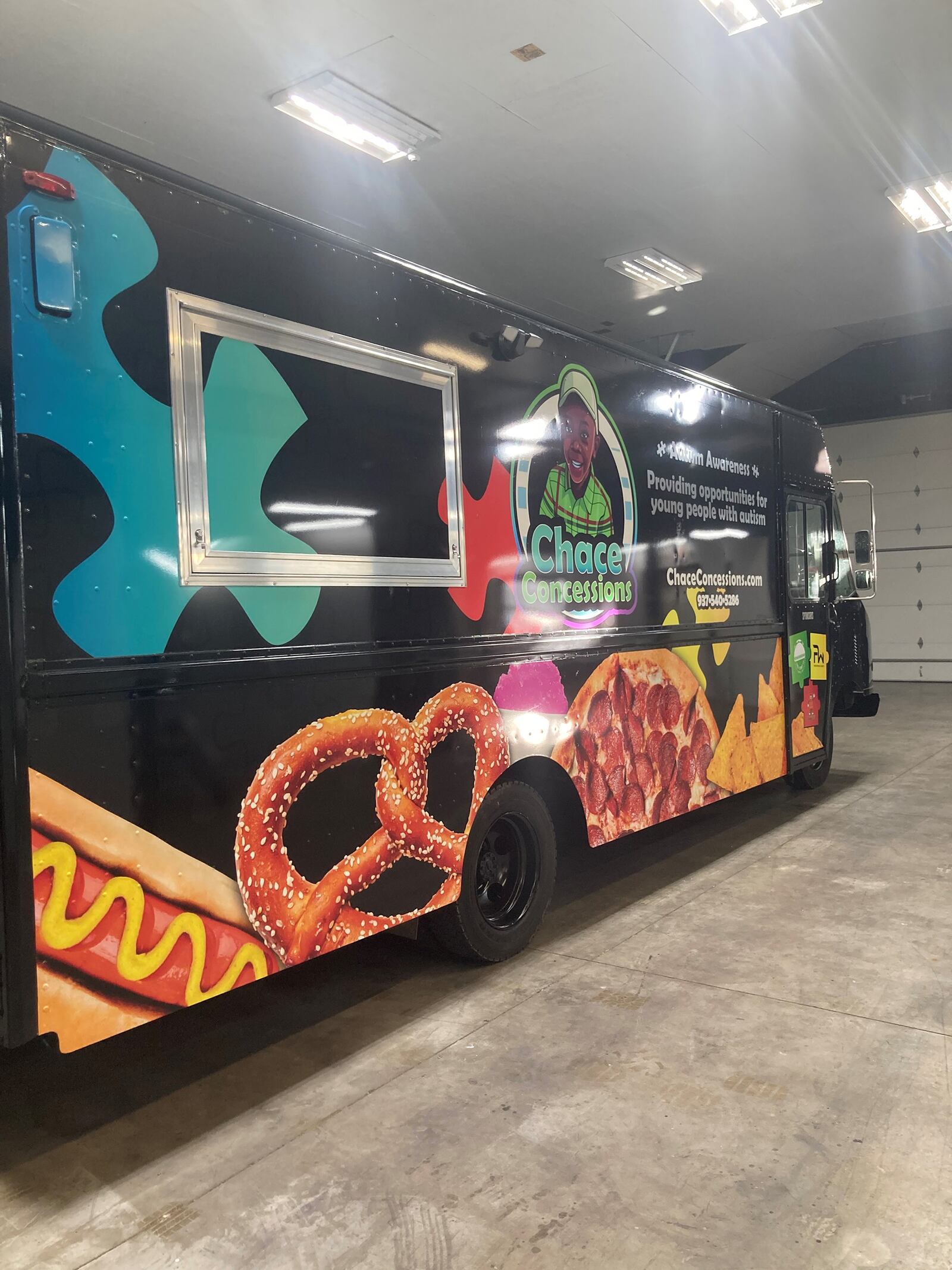 Winston has created a food truck in honor of her son Chace, who is autistic and non-verbal. The truck menu features some of his favorited foods - including those pictured on the wrap - and also helps raise awareness of autism. It will debut at the Autism Society Walk in April. CONTRIBUTED