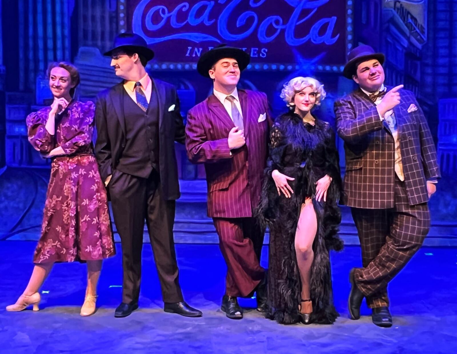 Left to right: Emily Brennan (Sarah Brown), Elliot Handkins (Sky Masterson), Cole Fletcher (Nathan Detroit), Allison Gabert (Adelaide) and Paul Hernandez (Nicely-Nicely Johnson) in La Comedia Dinner Theatre's production of "Guys and Dolls." PHOTO BY JUSTIN WALTON