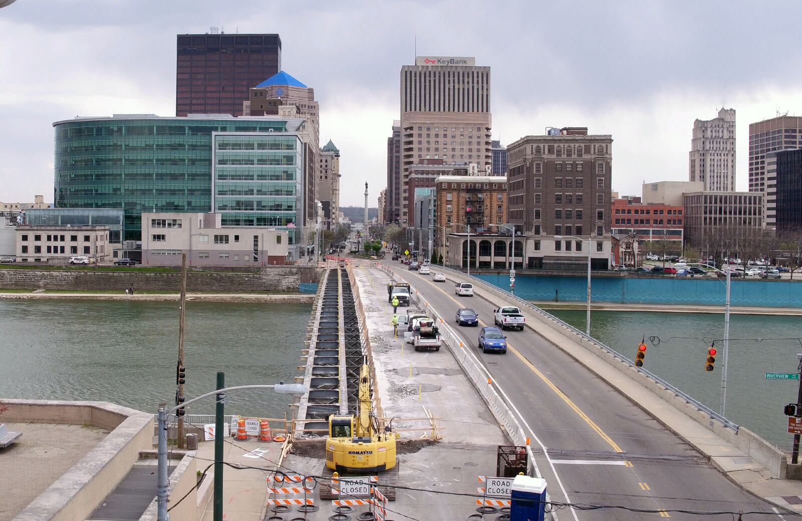 Renovation of the Main Street Bridge over the Great Miami River in downtown Dayton has traffic squeezed to one lane in each direction.The $8.8 million project began in March involves replacing the decking, sidewalks and lighting from the beams up.  Bridge decking from the east sidewalk removed, leaving just the beams exposed.  The 62 -year-old bridge renovation is an Ohio Department of Transportation project that is expected to take a year to complete.   TY GREENLEES / STAFF