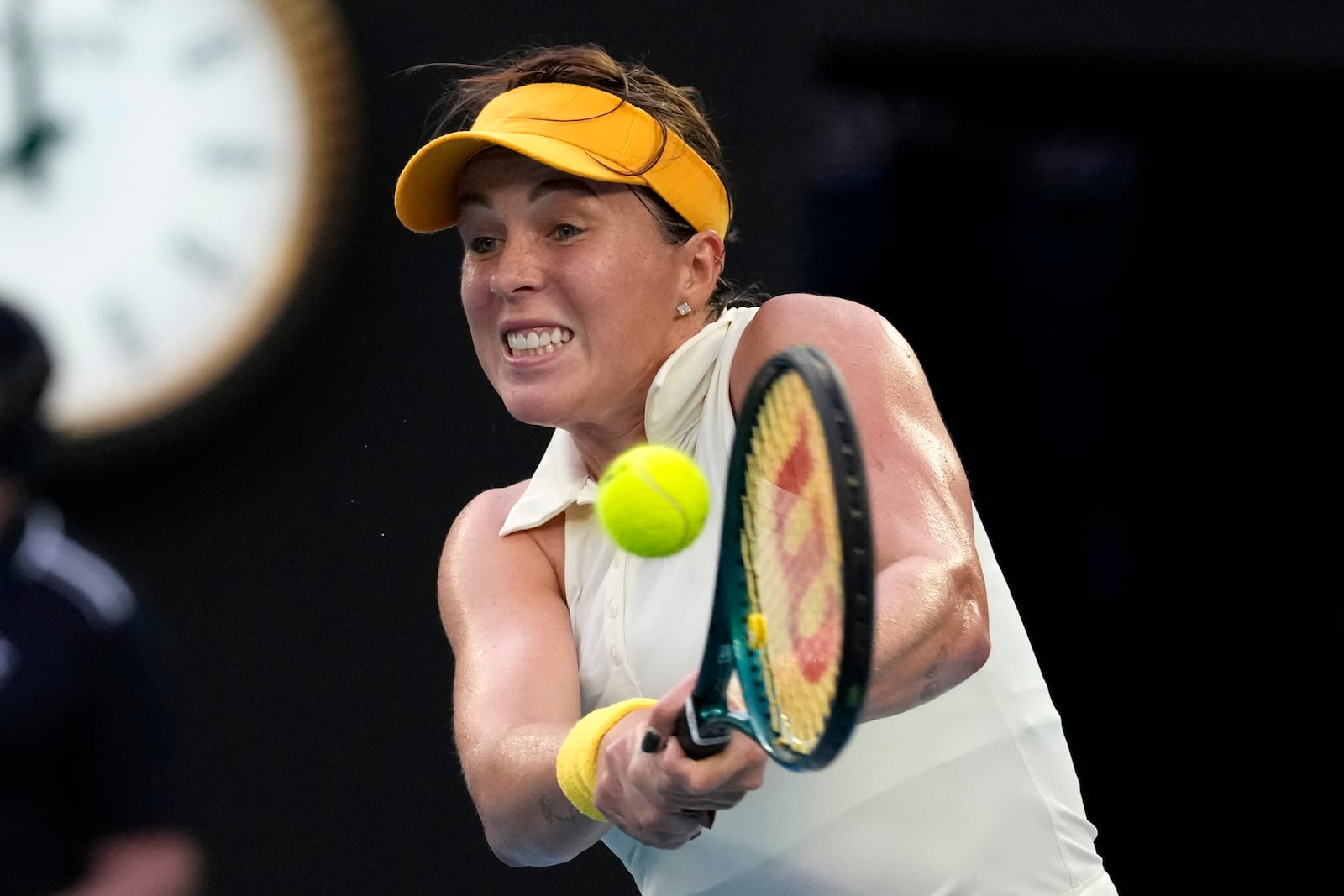 Anastasia Pavlyuchenkova of Russia plays a backhand return to Aryna Sabalenka of Belarus during their quarterfinal match at the Australian Open tennis championship in Melbourne, Australia, Tuesday, Jan. 21, 2025. (AP Photo/Manish Swarup)