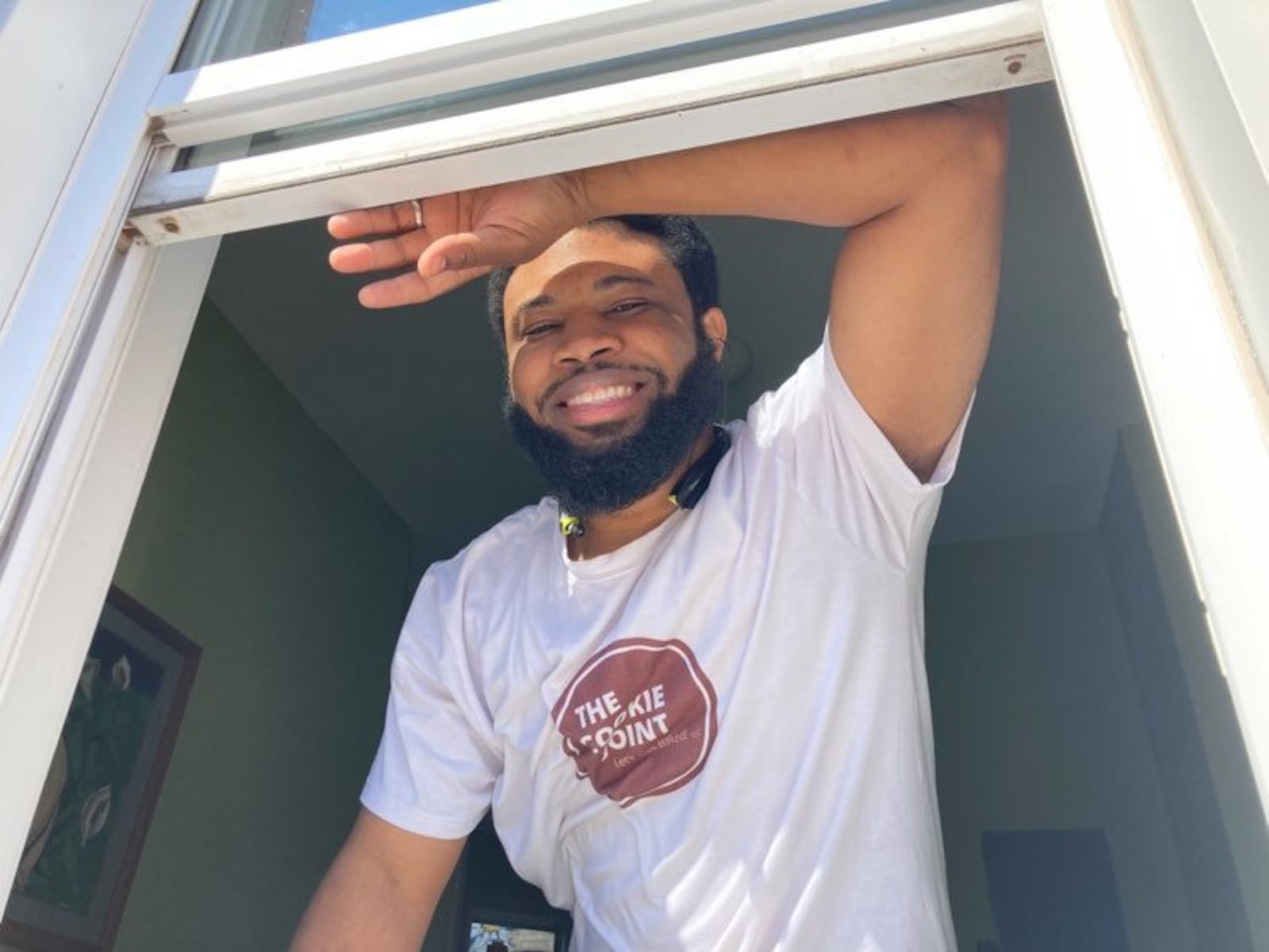 Isiah Davis bakes inside Butter Cafe on Brown St. in Dayton, and serves the cookies, fresh-baked and still hot, from the restaurant's carryout window. SARAH FRANKS/DAYTON DAILY NEWS