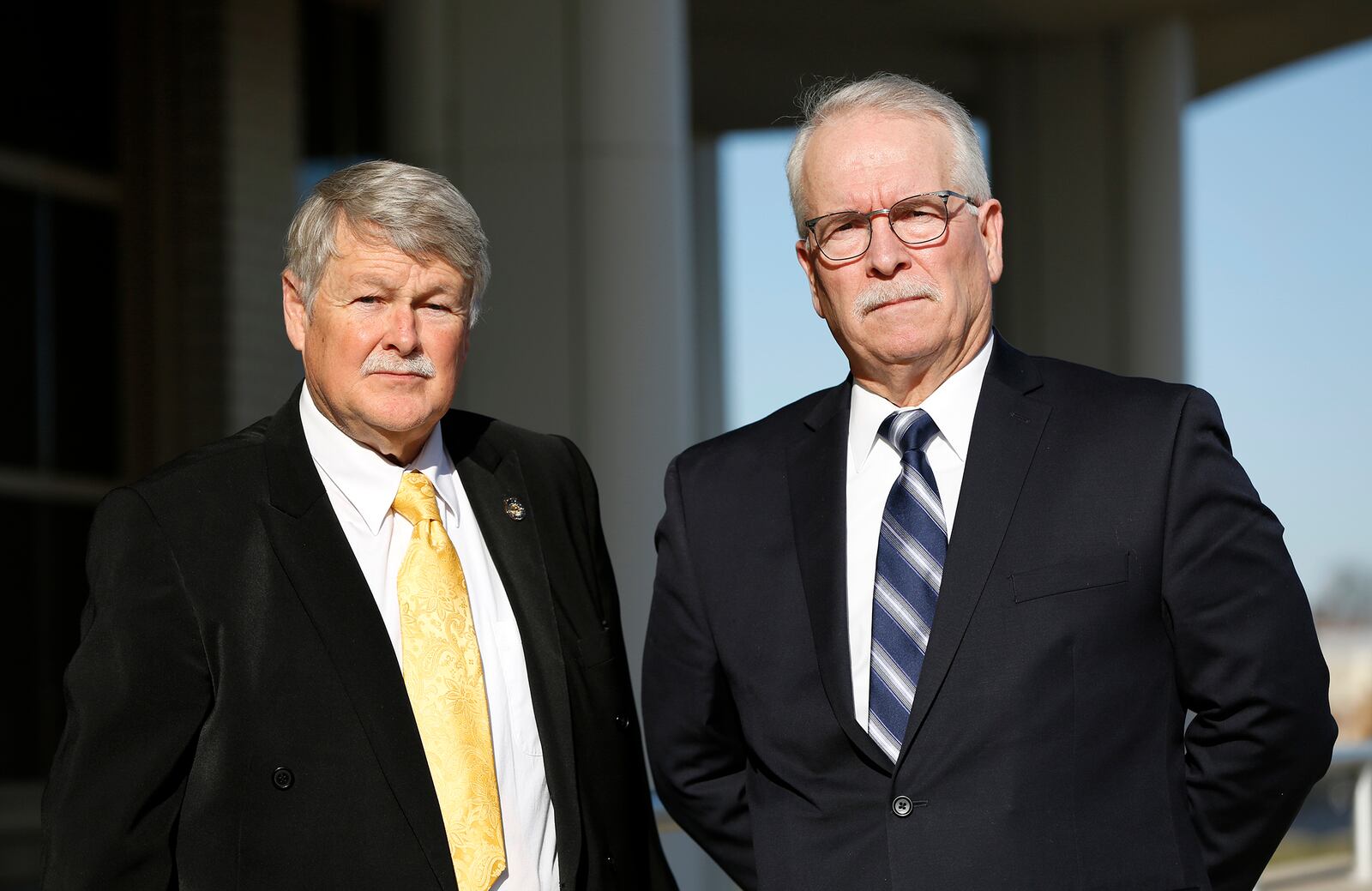 Doyle Burke (left) was a Dayton homicide detective in 1992 who worked the infamous "Christmas killings" case. John Huber (right), a Dayton police seargent at the time, spotted the car with the four killers inside leading to their arrest. The heinous crime, that took place over the Christmas weekend, was committed by a gang of youths. They killed six people and injured two. LISA POWELL / STAFF