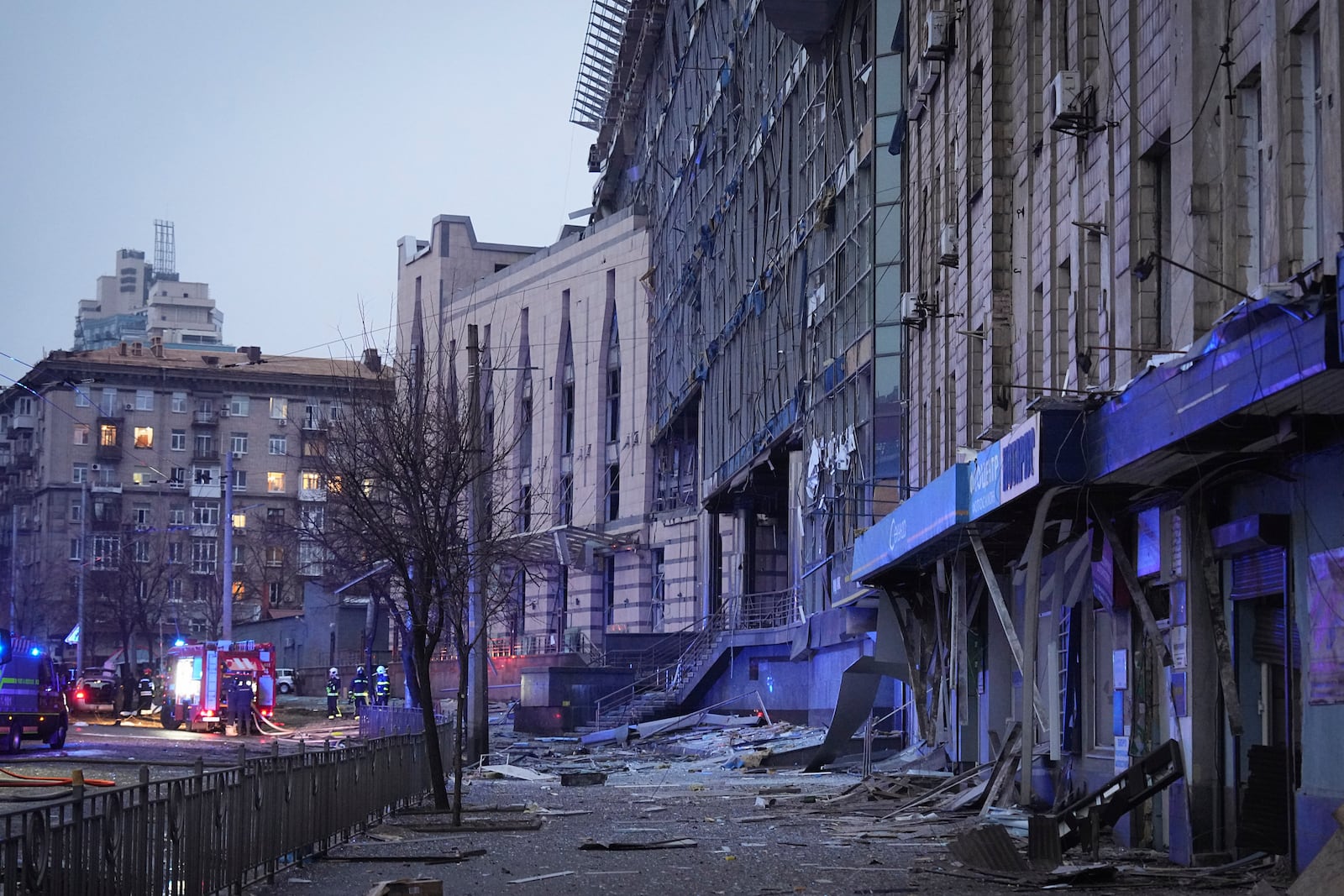 First responders work the scene following a Russian missile attack in Kyiv, Ukraine, Saturday, Jan. 18, 2025. (AP Photo/Efrem Lukatsky)