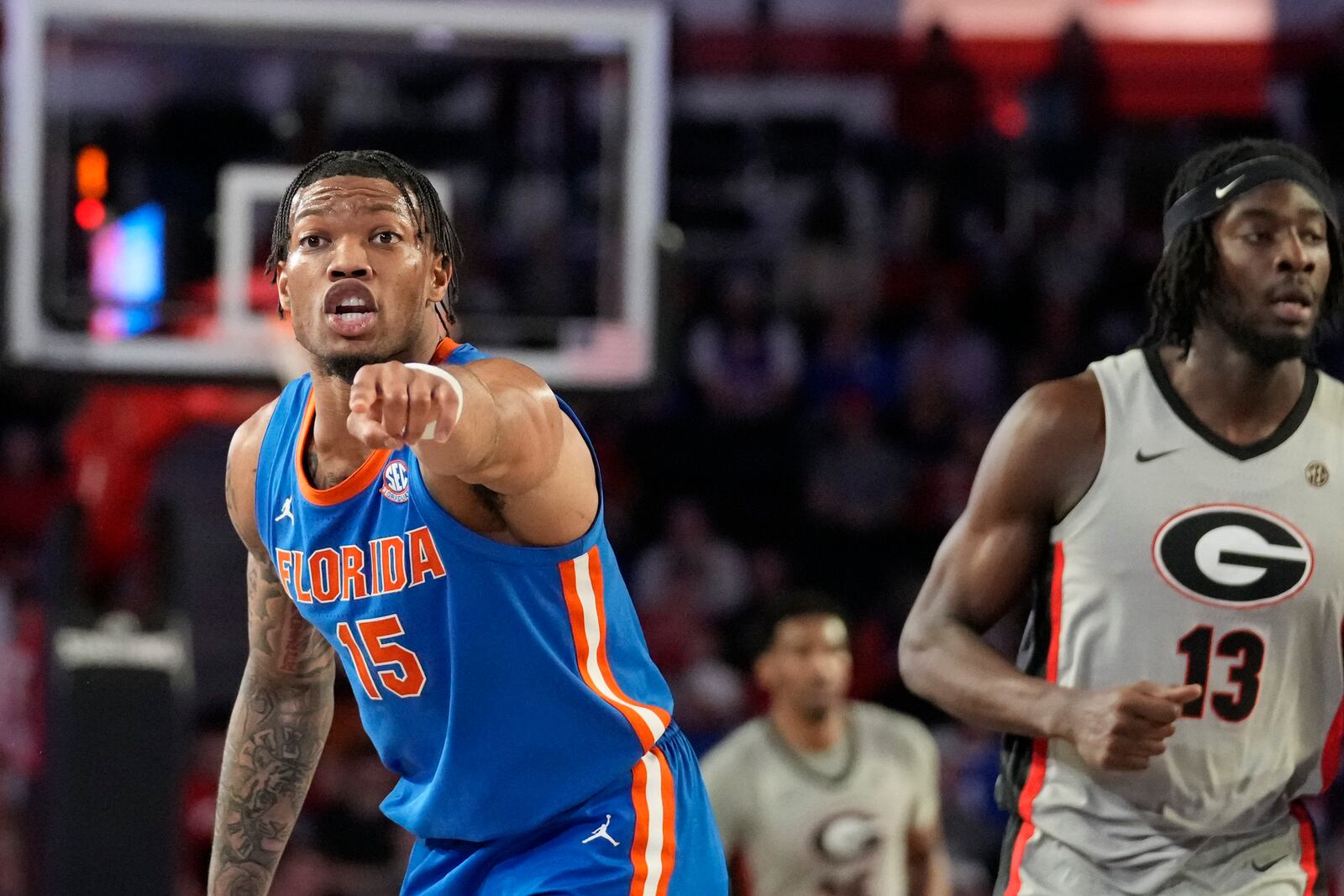 Florida guard Alijah Martin (15) yells towards his teammates during an NCAA college basketball game against Georgia, Tuesday, Feb. 25, 2025, in Athens, Ga. (AP Photo/Brynn Anderson)