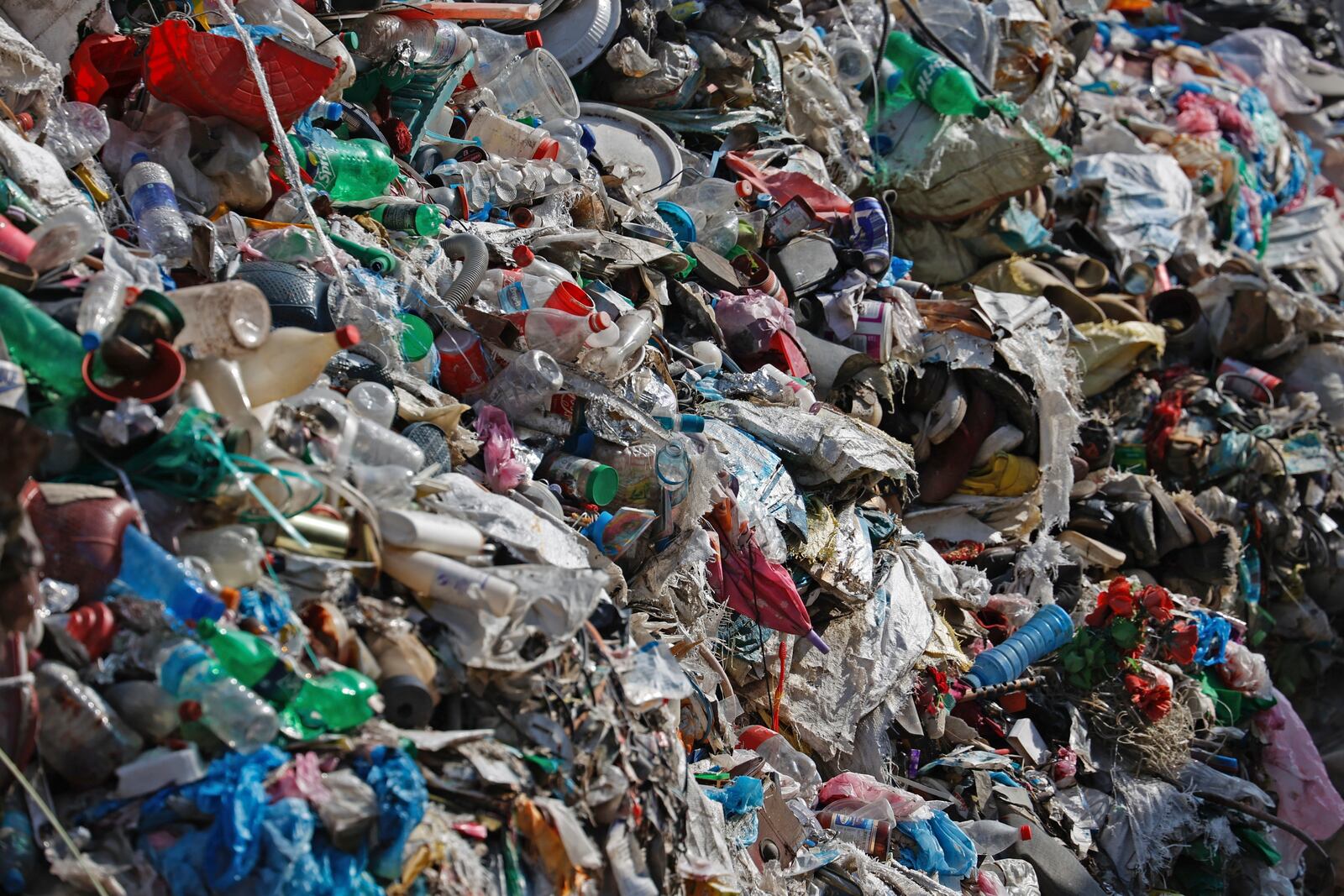 FILE - Garbage collected en route to Mount Everest is piled before it is sorted for recycling at a facility operated by Agni Ventures, an agency that manages recyclable waste, in Kathmandu, Nepal, June 24, 2024. (AP Photo/Sanjog Manandhar, File)