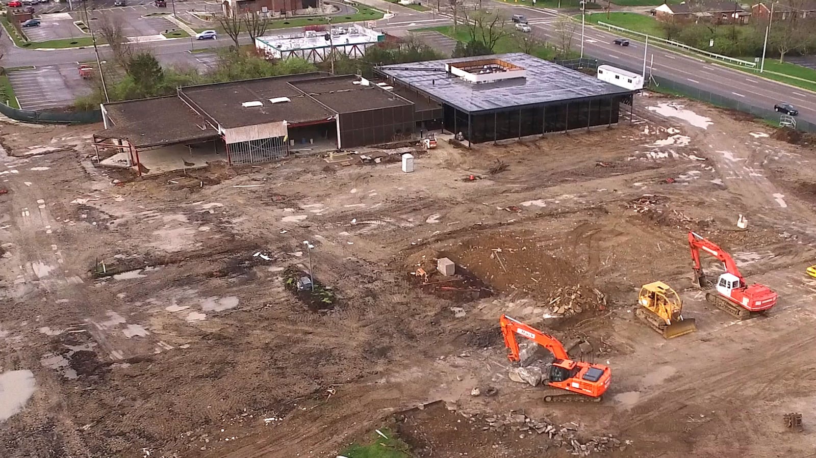 The $5 million renovation and expansion of the Woodbourne Library is moving along as crews continue removing foundation concrete from the two adjacent lots the library purchased to complete the project.  Opening of Woodourne Library campus is expected in the summer of 2018.   TY GREENLEES / STAFF