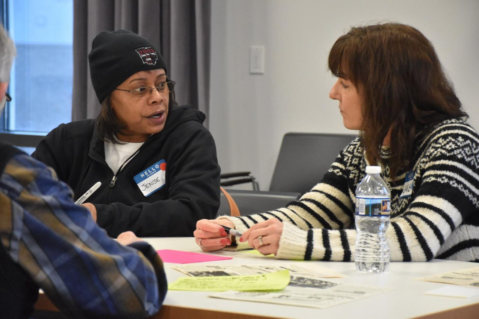 Participants at the Your Voice Ohio opioid forum discuss their thoughts about the causes and solutions to the area’s drug epidemic at the downtown Dayton Metro Library, Sunday, Feb. 11, 2018. DOUG OPLINGER/Contributed