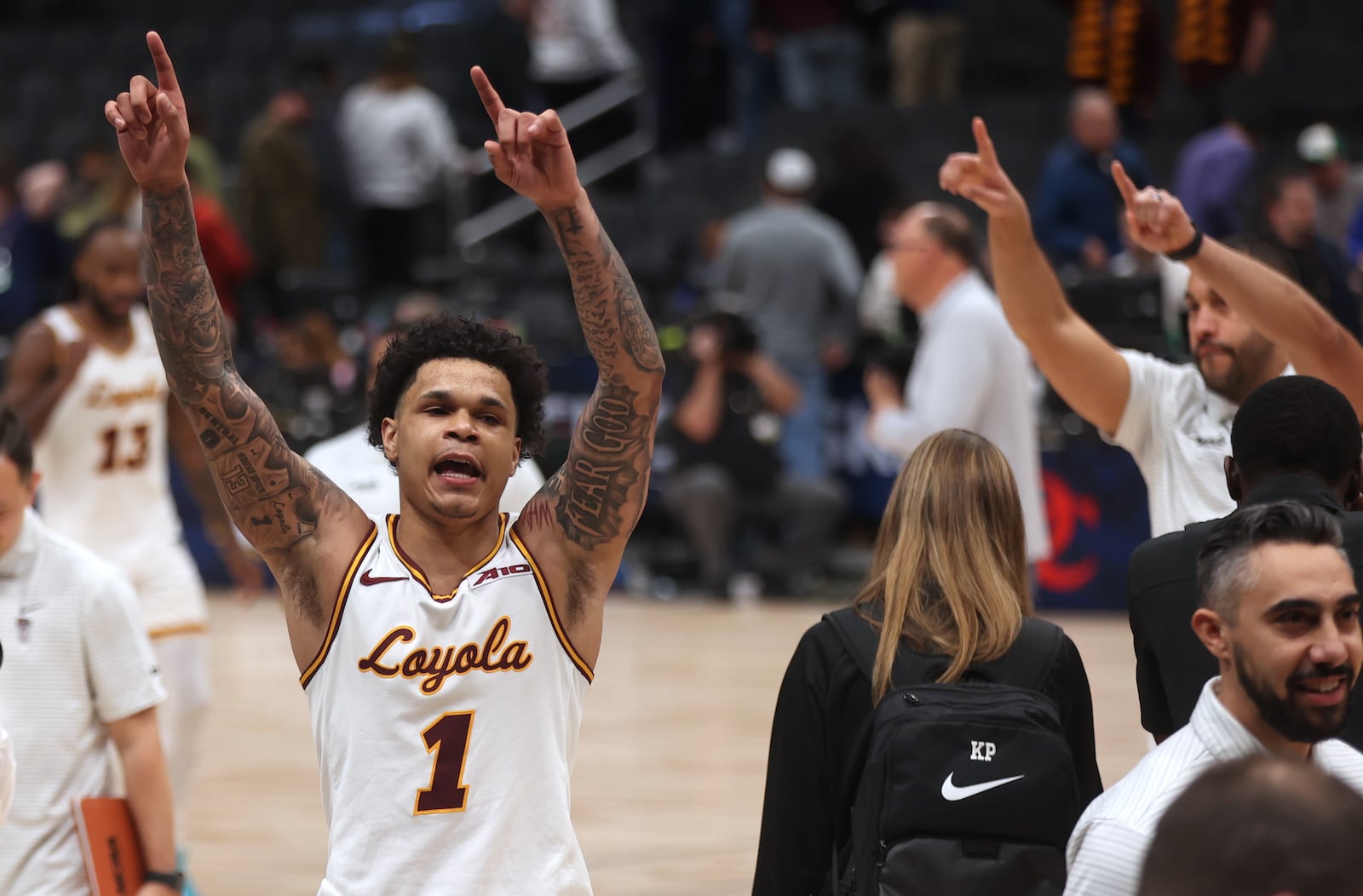 Loyola Chicago's Jayden Dawson celebrates a victory against Saint Louis in the quarterfinals of the Atlantic 10 Conference tournament on Thursday, March 13, 2025, at Capital One Arena in Washington, D.C. David Jablonski/Staff