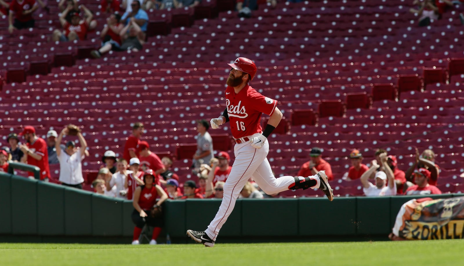 Colin Moran, of the Reds, rounds the bases after a three-run home run against the Brewers in the eighth inning on Wednesday, May 11, 2022, at Great American Ball Park in Cincinnati. David Jablonski/Staff