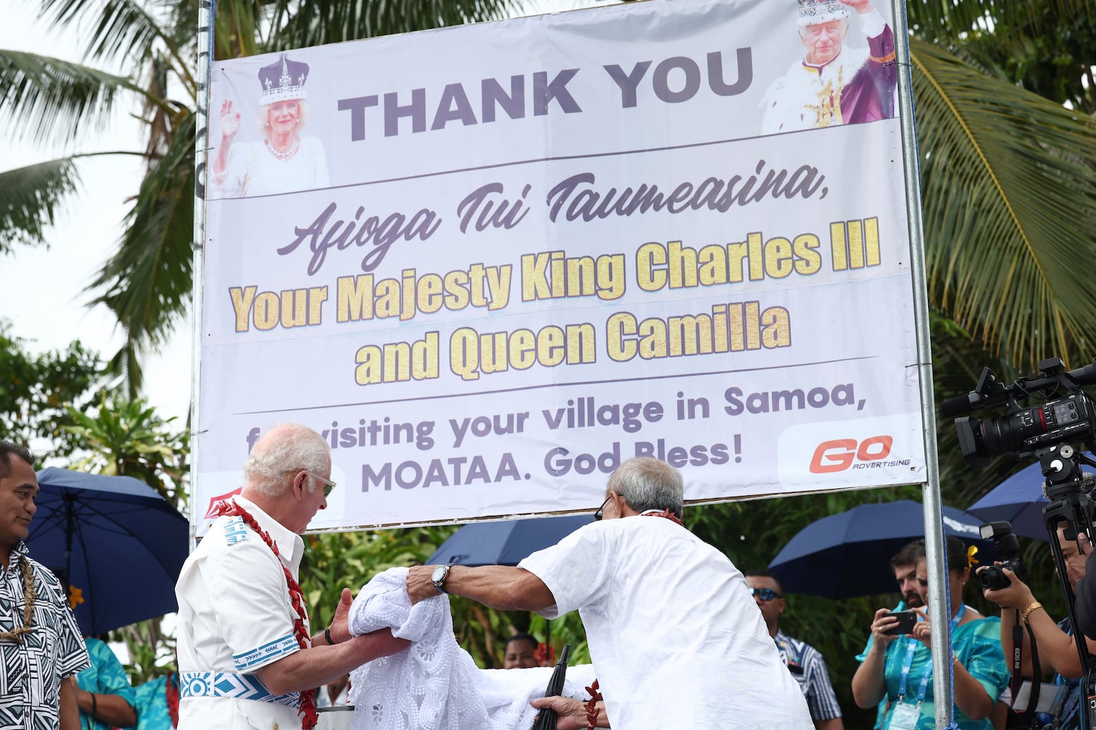 Britain's King Charles III, second left, visits the Mangrove Restoration Project at Moata'a Village in Apia, Samoa Thursday, Oct. 24, 2024. (Manaui Faulalo/Pool Photo via AP)