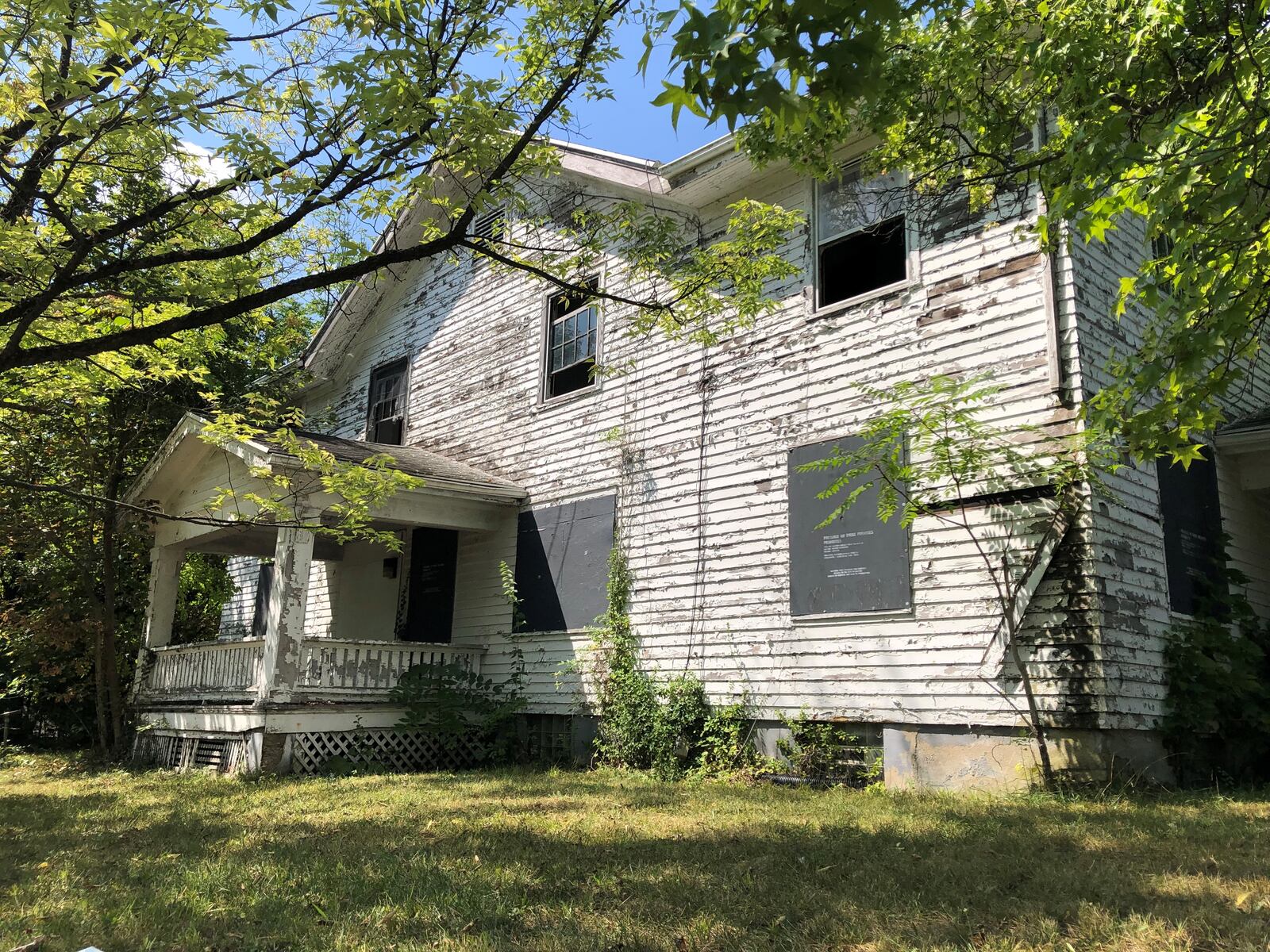 A vacant and deteriorating home on the 600 block of Oxford Avenue. Neighbors say the property attracts criminal activities including illegal dumping. CORNELIUS FROLIK / STAFF