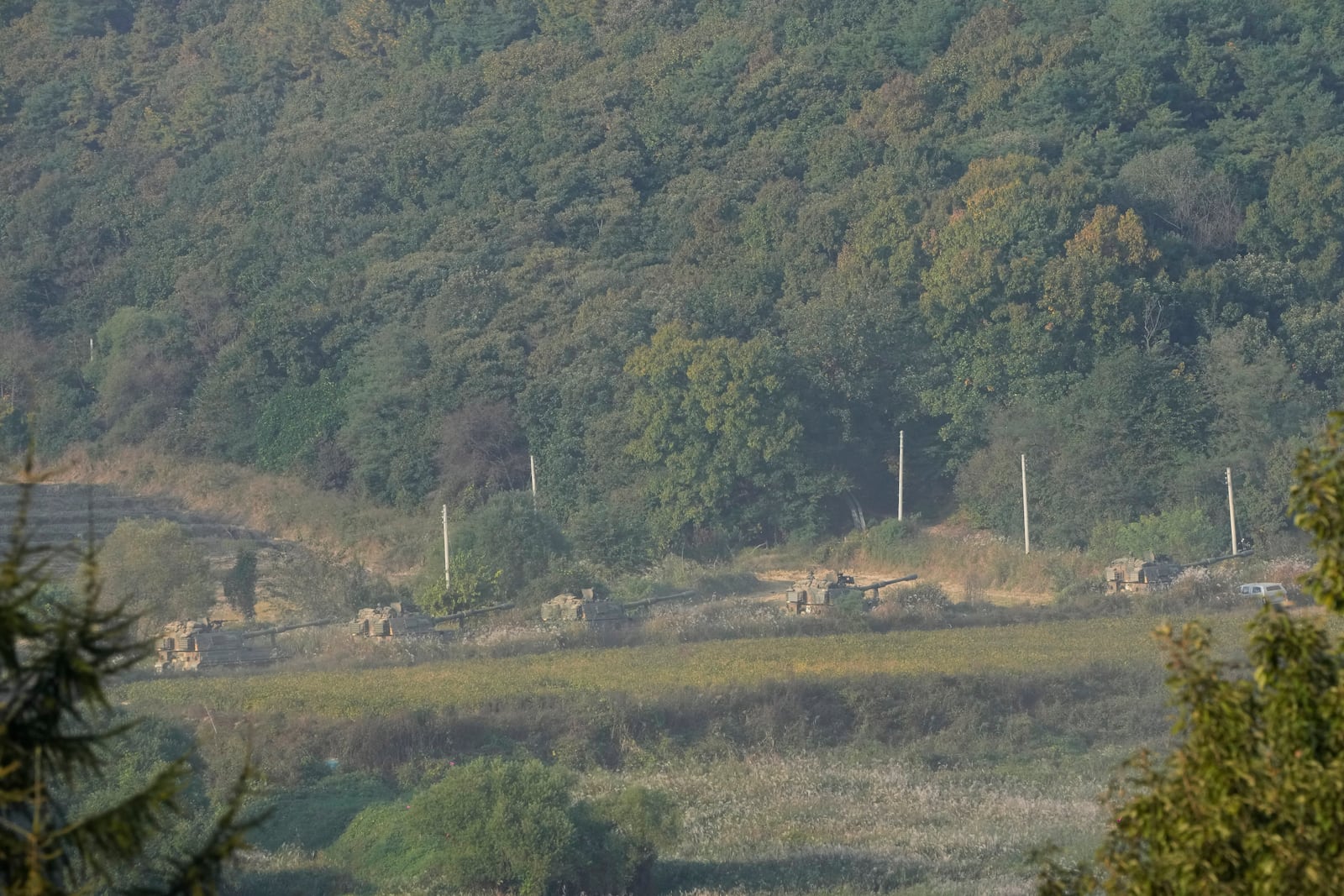 South Korean army K-9 self-propelled howitzers move in Paju, near the border with North Korea, South Korea, Thursday, Oct. 17, 2024. (AP Photo/Ahn Young-joon)