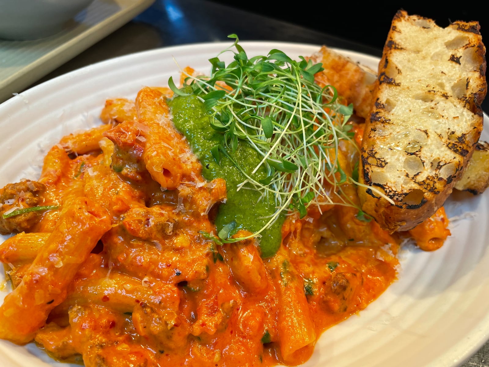 Corner Kitchen is located at 613 E. Fifth St. in Dayton’s Oregon District. Pictured is chorizo ala vodka. NATALIE JONES/STAFF