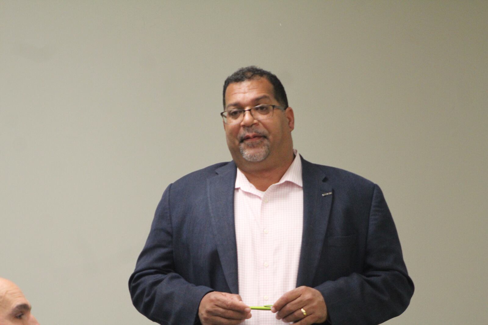 Dayton City Commissioner Chris Shaw speaks at a candidate forum hosted by the Dayton Unit NAACP. CORNELIUS FROLIK / STAFF