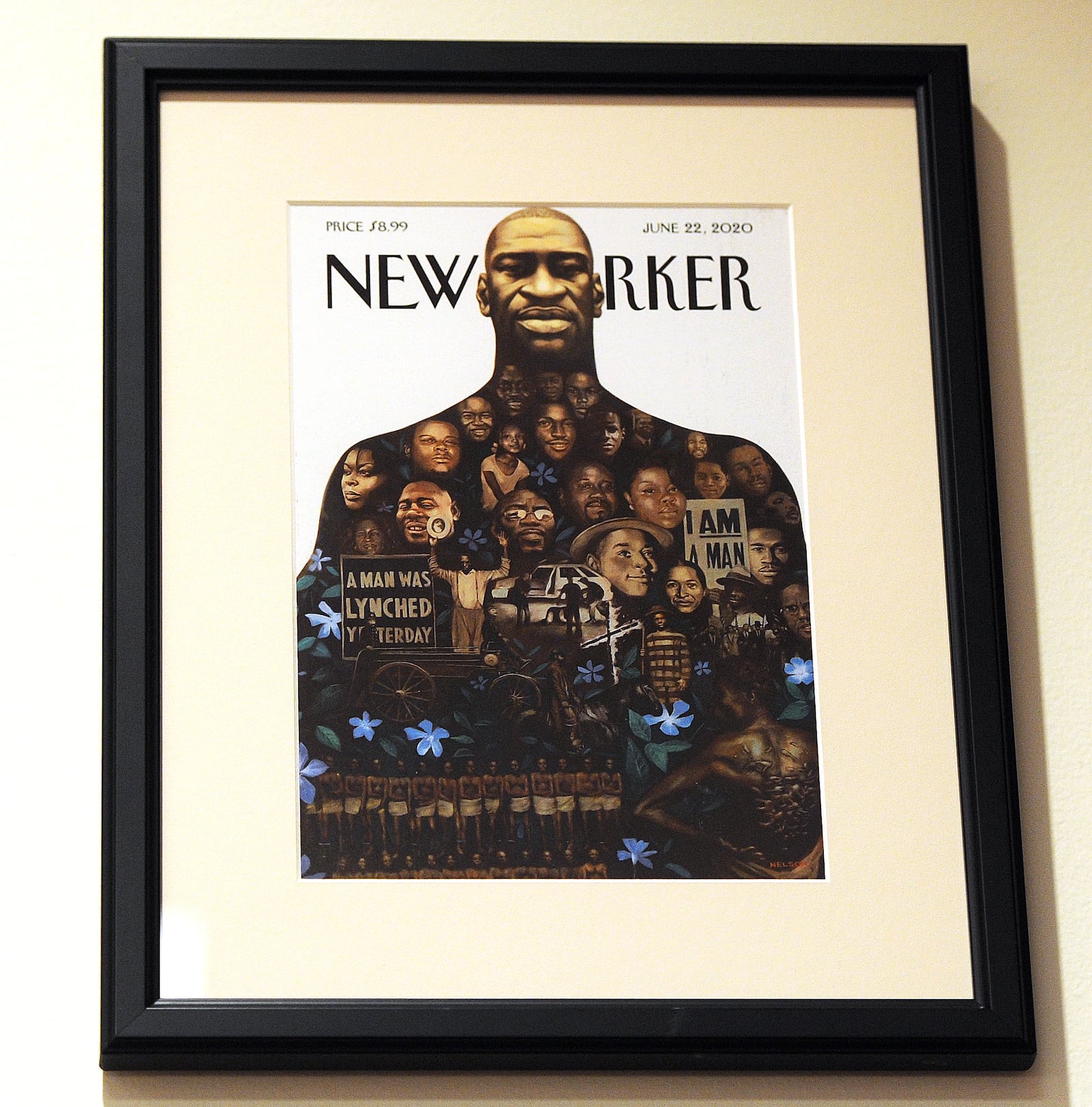 A framed magazine cover featuring George Floyd is hung near the witnesses inside Montgomery County Common Pleas Judge Steven Dankof’s courtroom. MARSHALL GORBY\STAFF