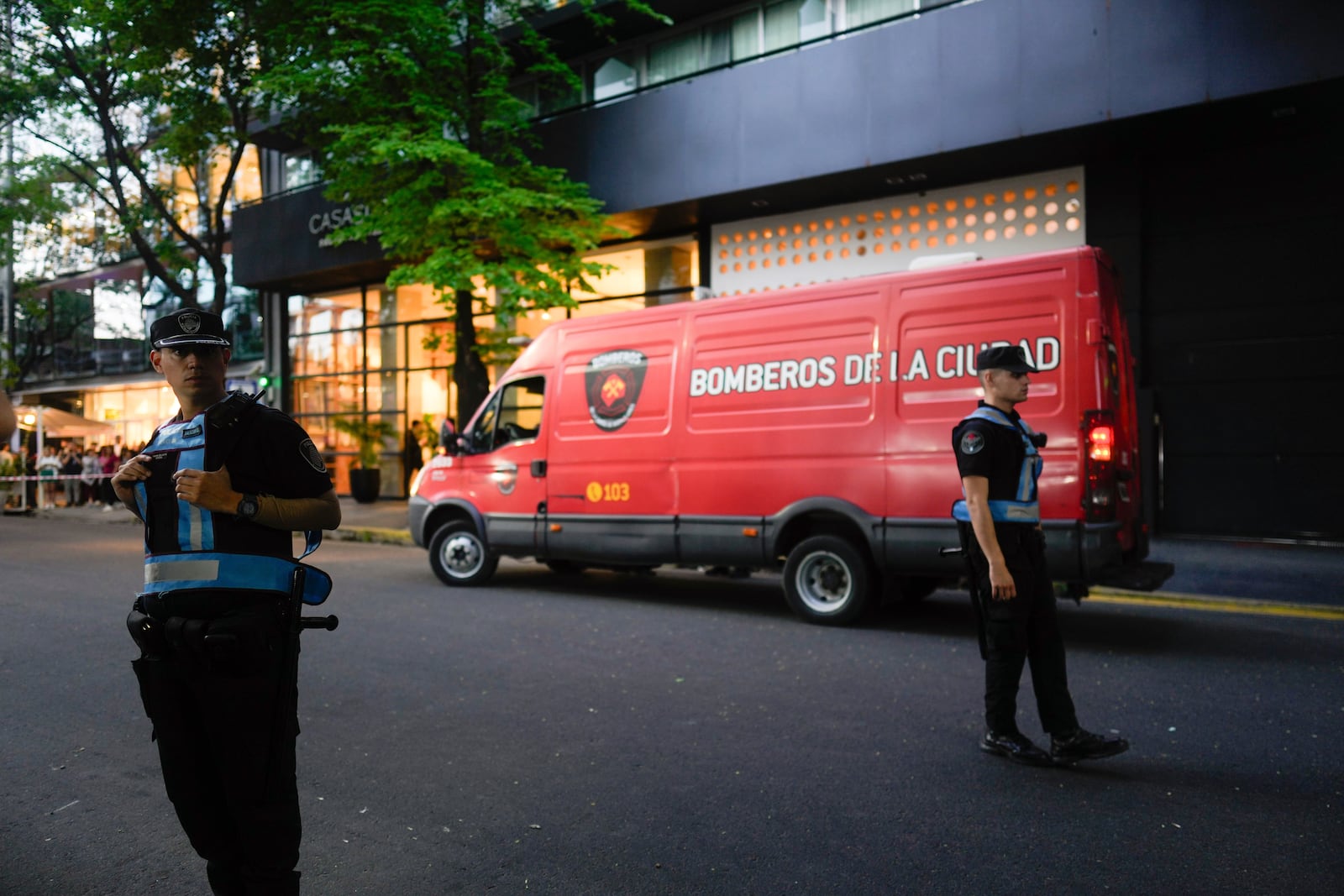 Police stand guard outside a hotel where Liam Payne, a former member of the band One Direction, was found dead after falling from a balcony in Buenos Aires, Argentina, Wednesday, Oct. 16, 2024. (AP Photo/Natacha Pisarenko)