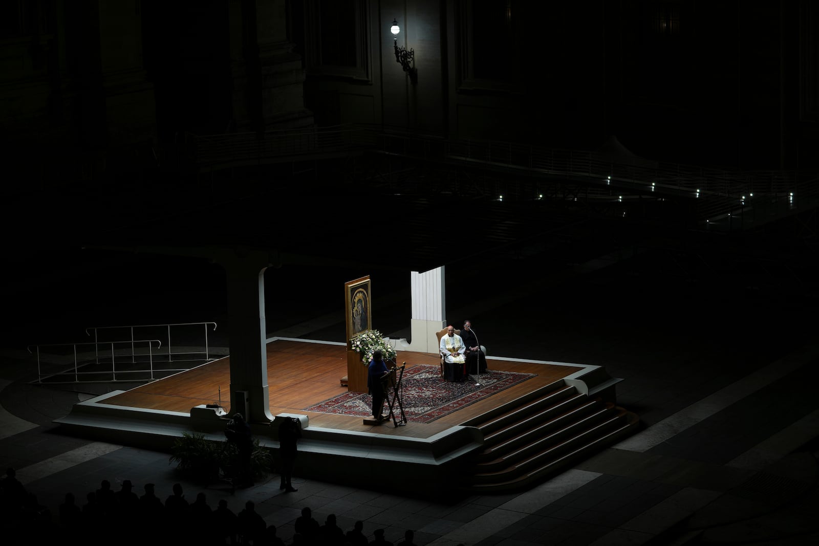 The Pope's vicar for the dioceses of Rome Cardinal Baldassarre Reina during a rosary prayer held for the health of Pope Francis in St Peter's Square at The Vatican, Thursday, Feb. 27, 2025. (AP Photo/Kirsty Wigglesworth)