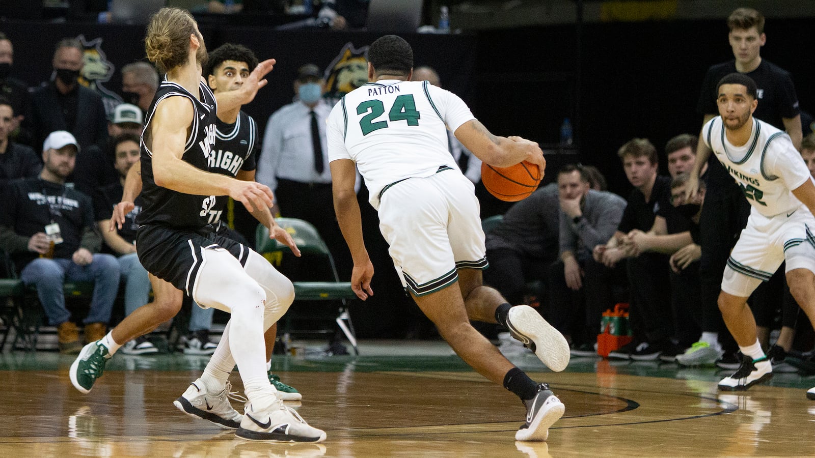 Cleveland State's Torey Patton drives against Wright State's Tim Finke during the Vikings' 71-67 victory over Wright State on Friday at the Nutter Center. Patton scored a game-high 25 points and made four steals. Jeff Gilbert/CONTRIBUTED