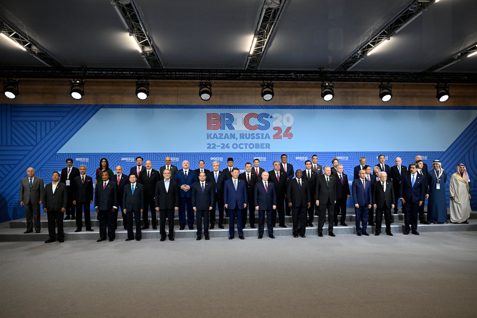 The heads of delegations pose for a family photo prior to Outreach/BRICS Plus format session at the BRICS Summit in Kazan, Russia, Thursday, Oct. 24, 2024. (Alexander Nemenov, Pool Photo via AP)