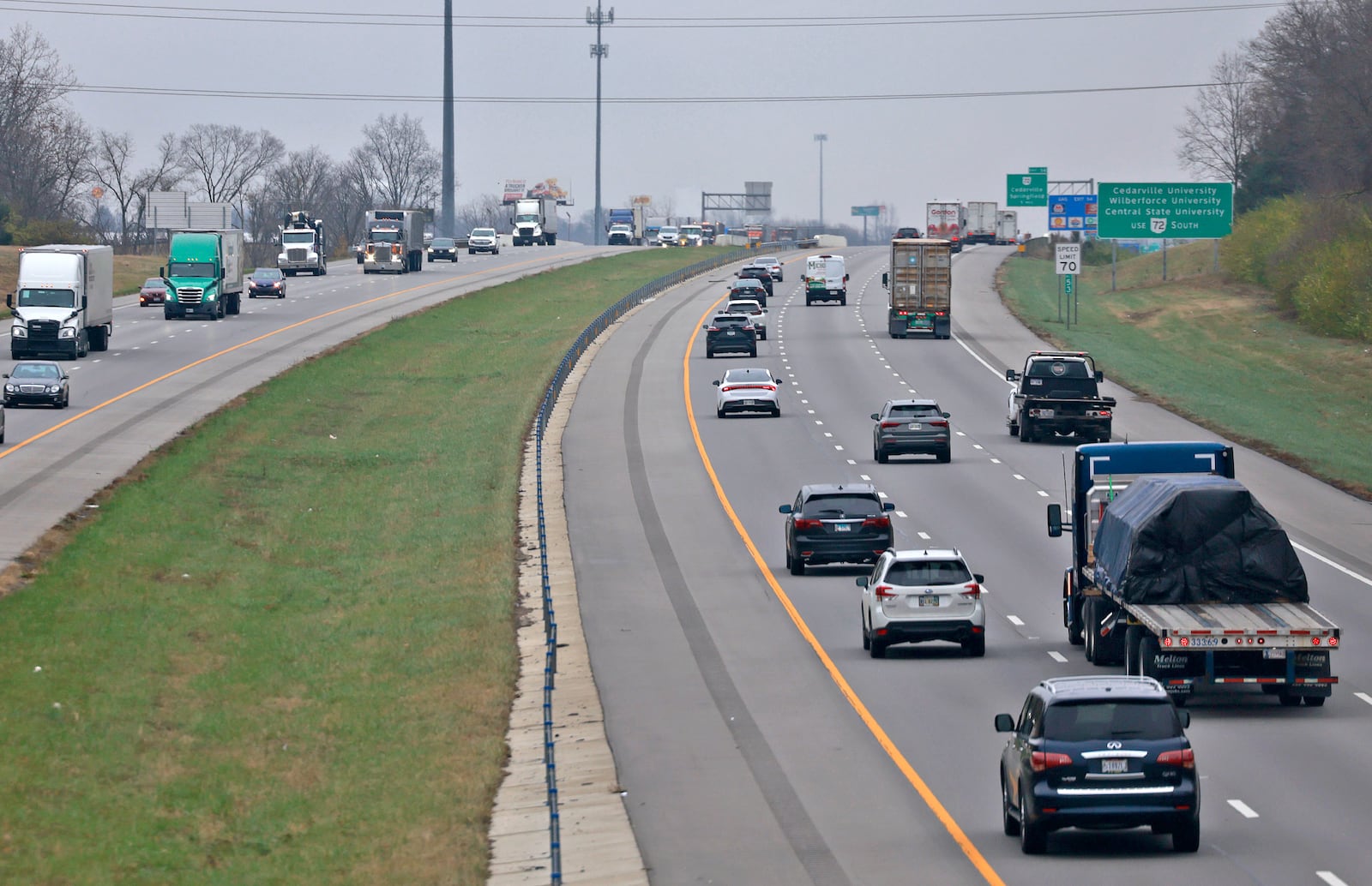 Vehicles move along Interstate 70 in Clark County Friday, Nov. 22, 2024. More than 3.2 million Ohioans will travel 50 miles or more away from home for the Thanksgiving holiday this week, 2.1% more than last year, according to AAA. BILL LACKEY/STAFF