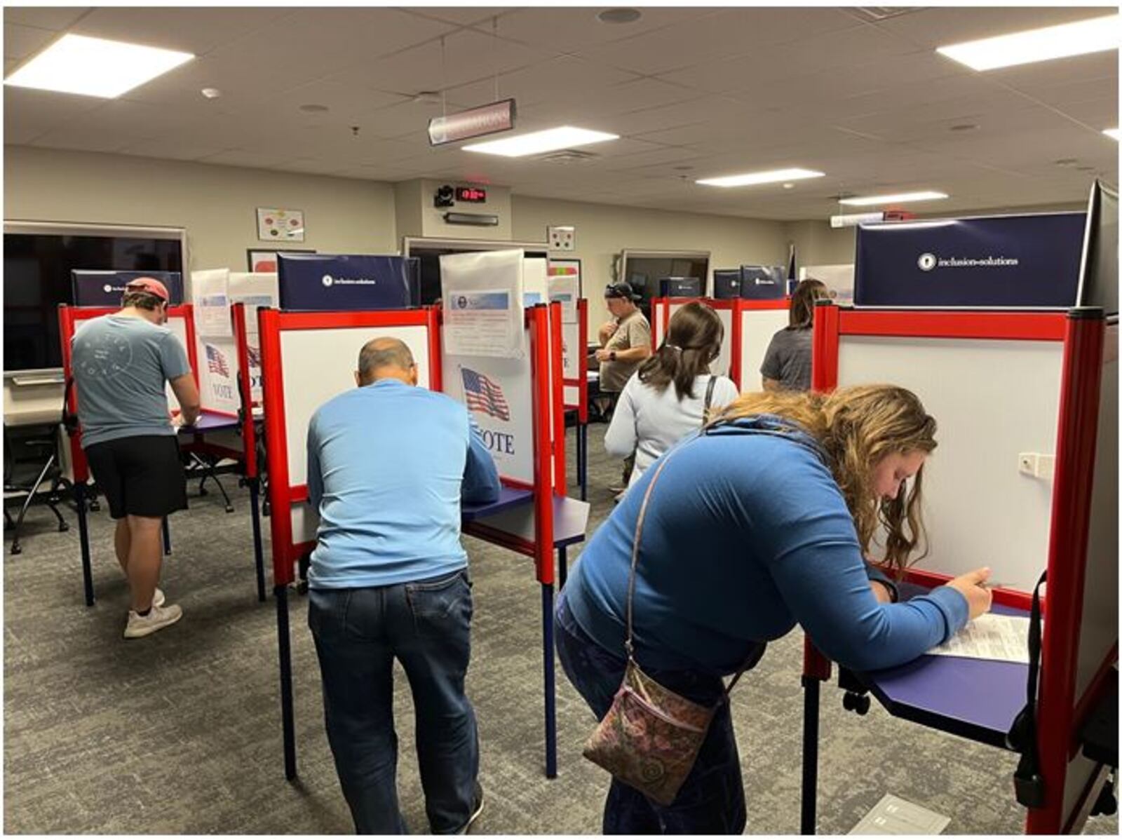 After a short wait, these Warren County residents marked their ballots during an early voting session at the Warren County Board of Elections on Sunday. ED RICHTER/STAFF