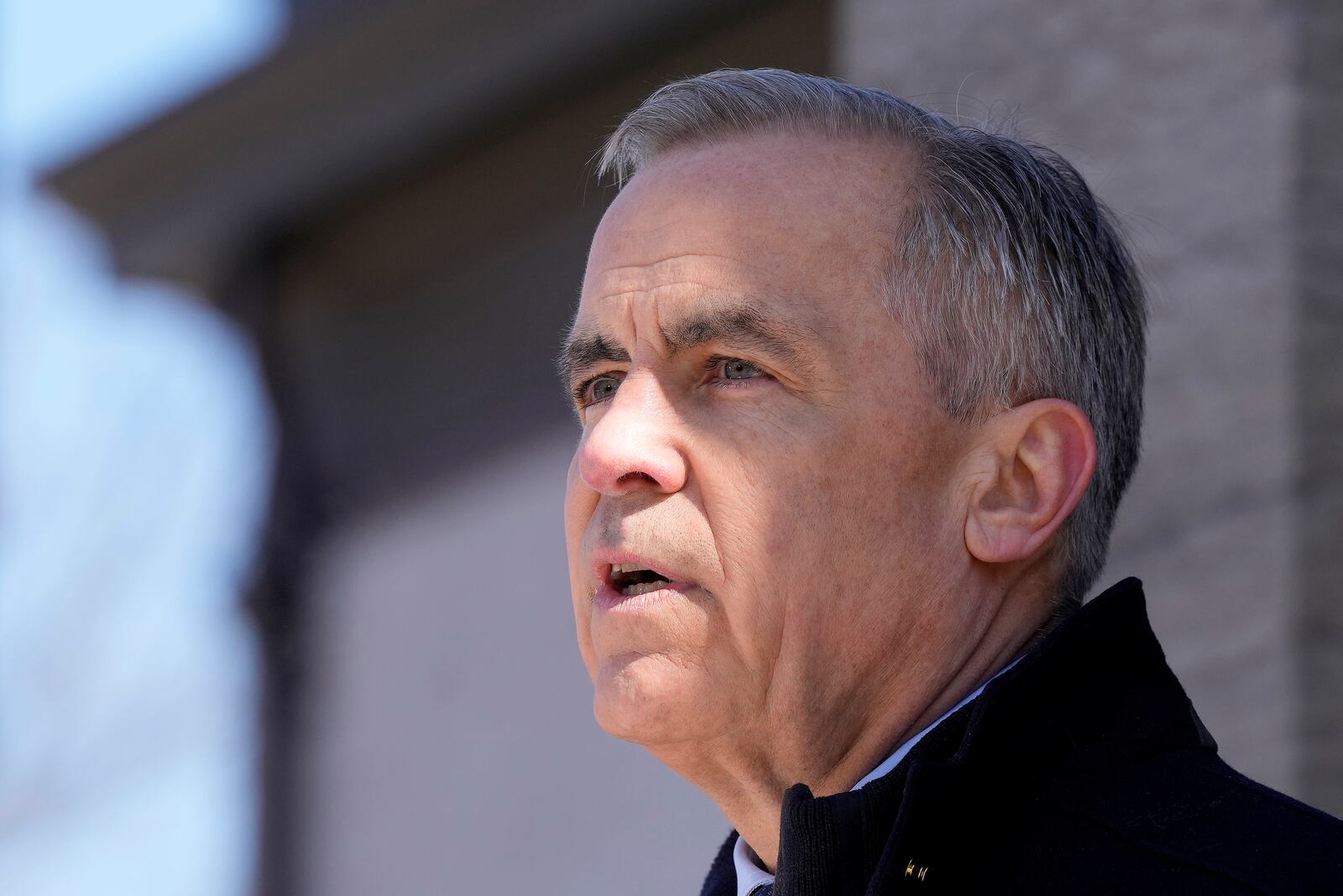 Canada Prime Minister Mark Carney speaks to media at Rideau Hall, where he asked the Governor General to dissolve Parliament and call an election, in Ottawa, Sunday, March 23, 2025. (Frank Gunn/The Canadian Press via AP)