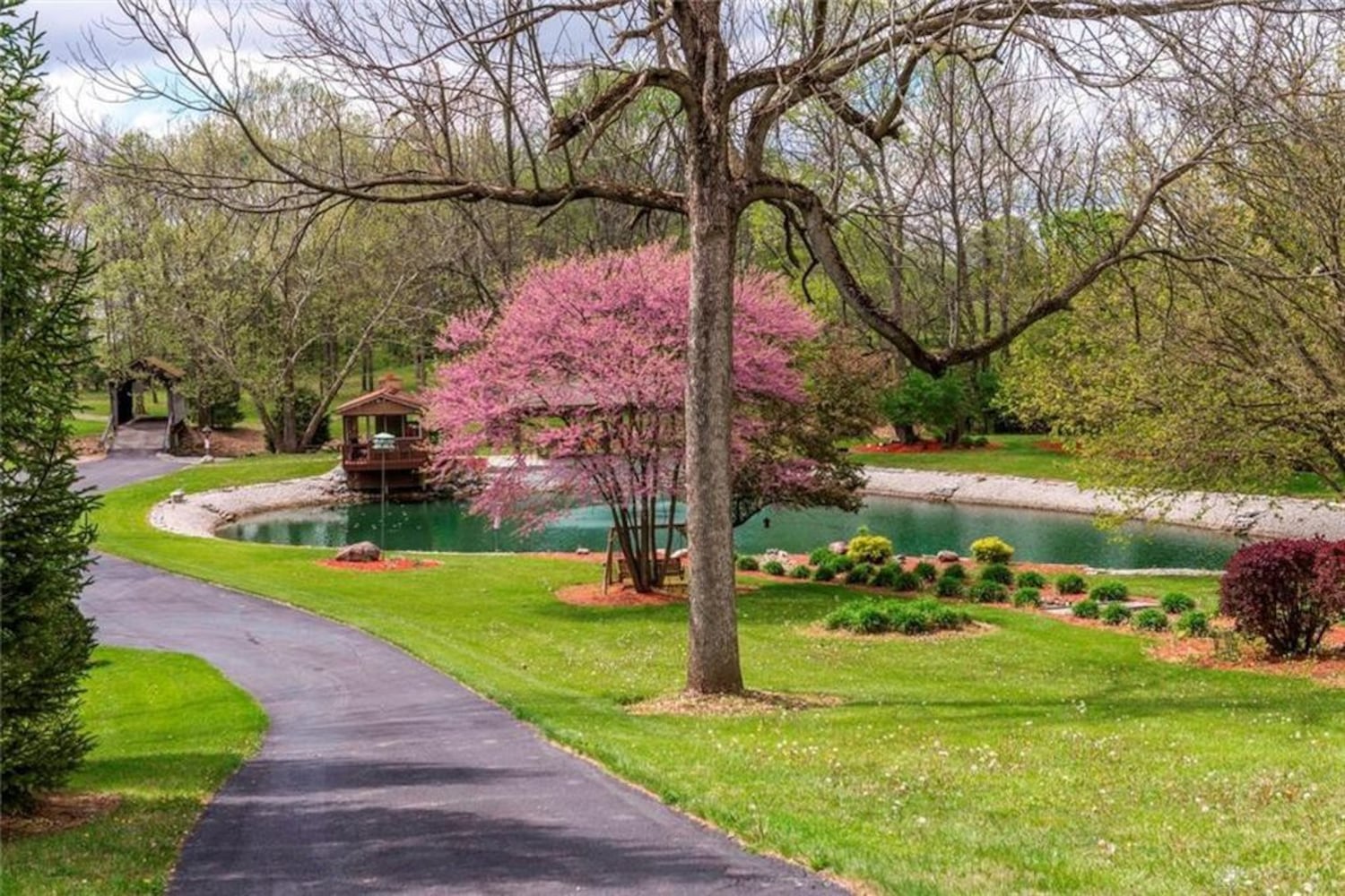 PHOTOS: Nearly 10-acre Miami County property listed has luxury home, stocked fishing pond