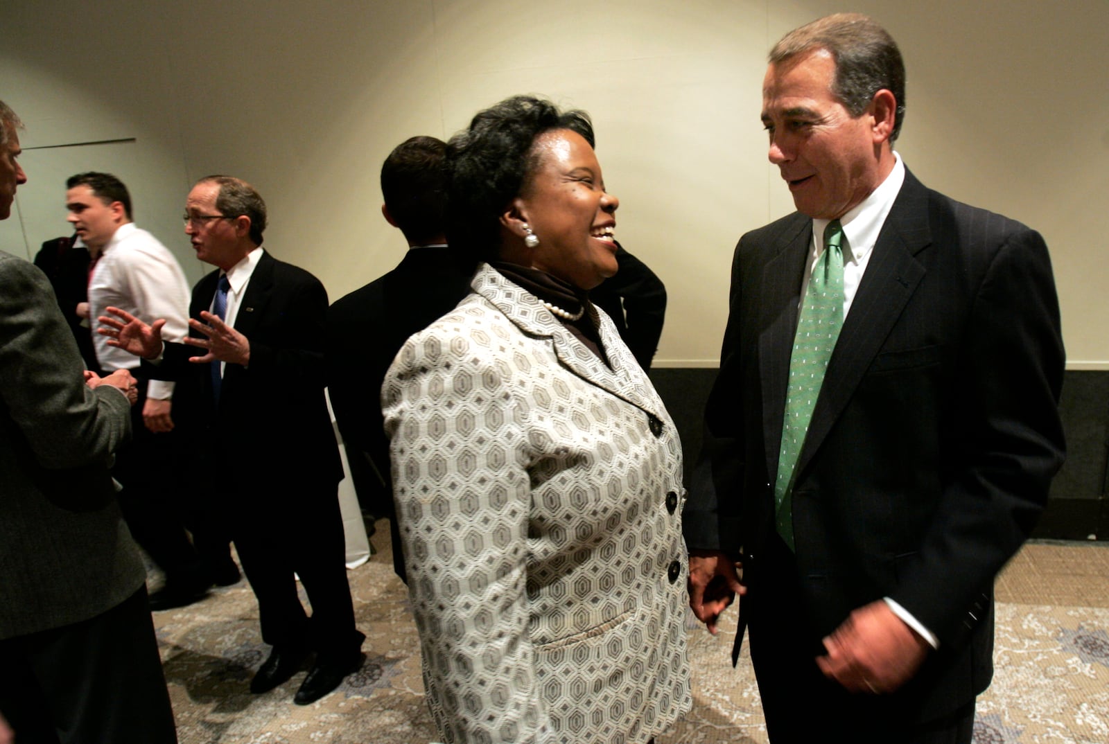 The U.S. House Minority Leader talks with Middletown Vice Mayor Anita Scott Jones Monday, March 1, after a Chamber of Commerce event.