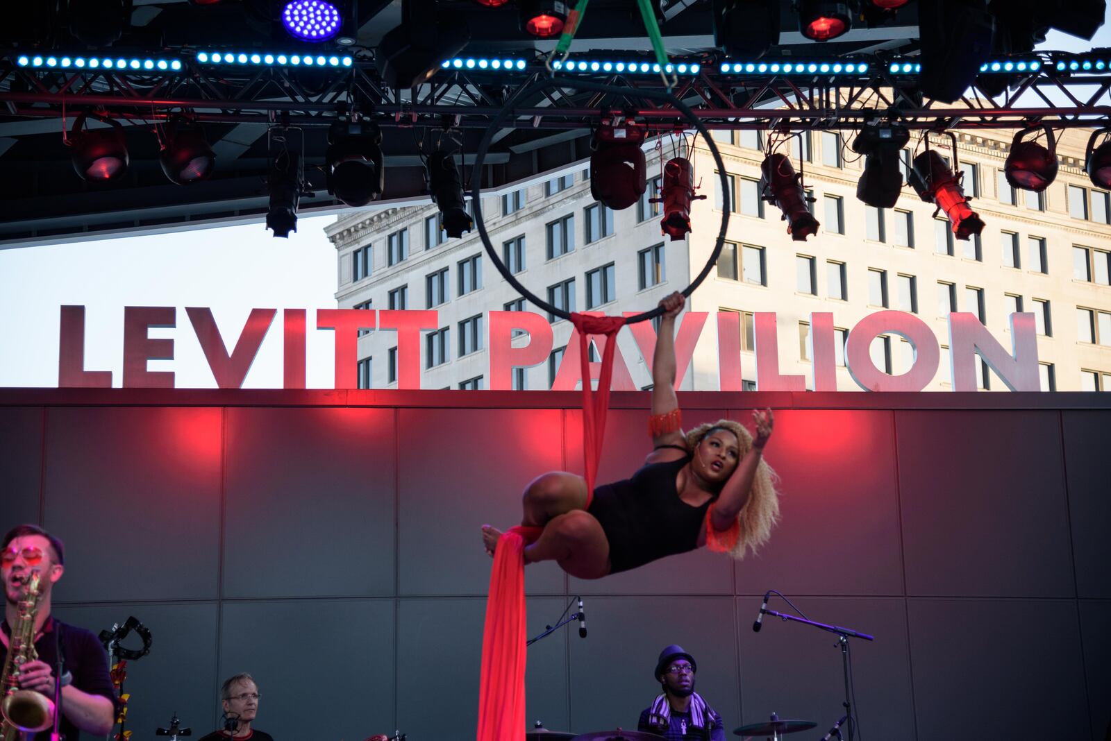 MojoFlo performed a free concert at downtown Dayton's Levitt Pavilion on Friday, July 19. The neo funk group is as known for their captivating stage performance as their infectious rhythms and catchy lyrics. TOM GILLIAM / CONTRIBUTING PHOTOGRAPHER