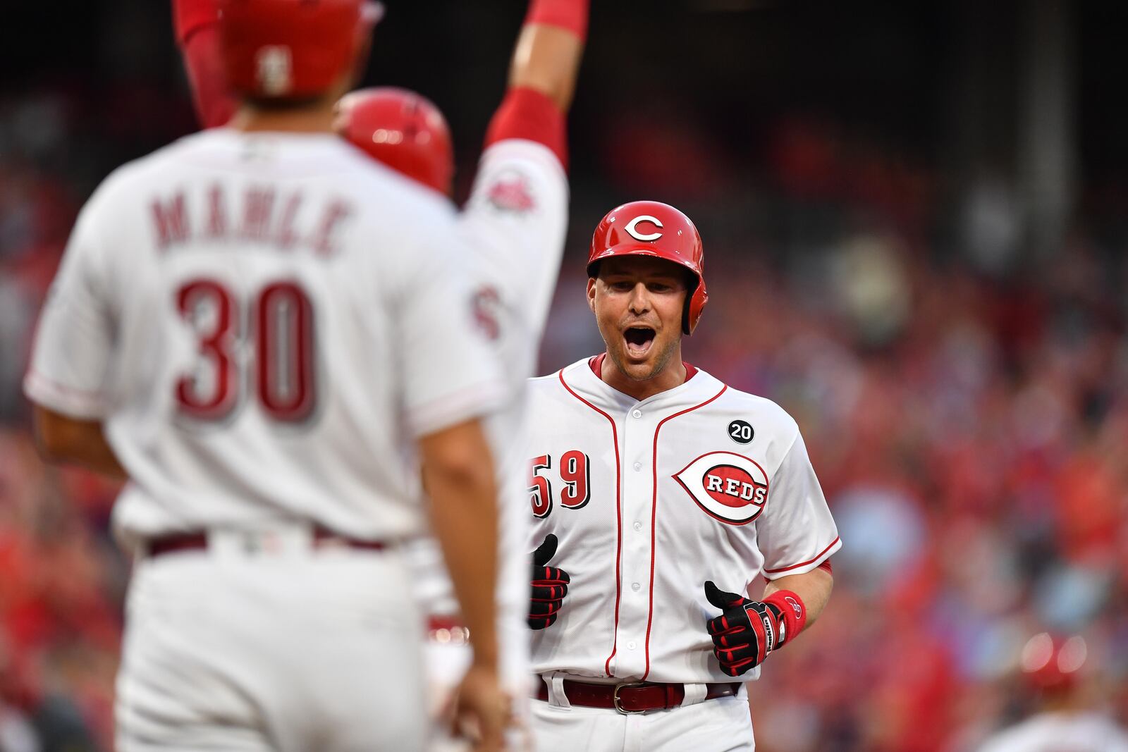 CINCINNATI, OH - JULY 19:  Ryan Lavarnway #59 of the Cincinnati Reds celebrates at home plate after hitting a three-run home run in the fourth inning against the St. Louis Cardinals at Great American Ball Park on July 19, 2019 in Cincinnati, Ohio.  (Photo by Jamie Sabau/Getty Images)